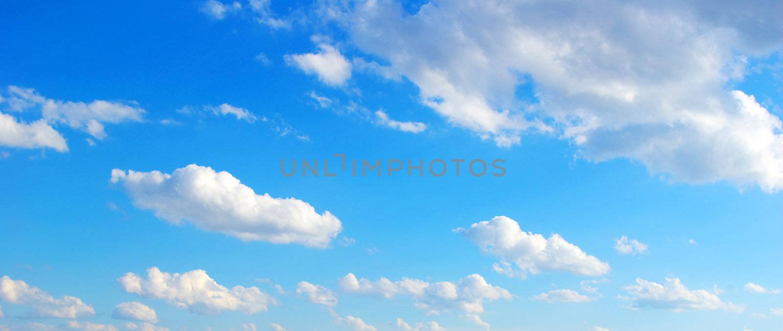 Blue Sky background with tiny clouds