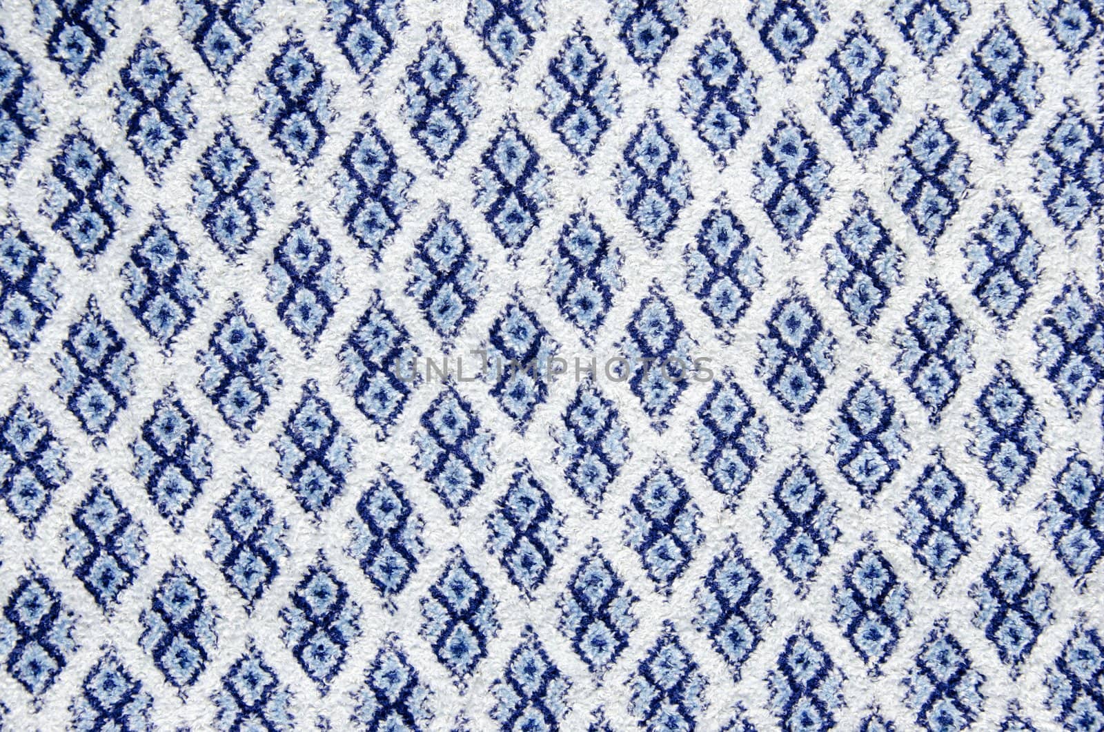 Background texture of retro carpet. Old fabric ornaments.