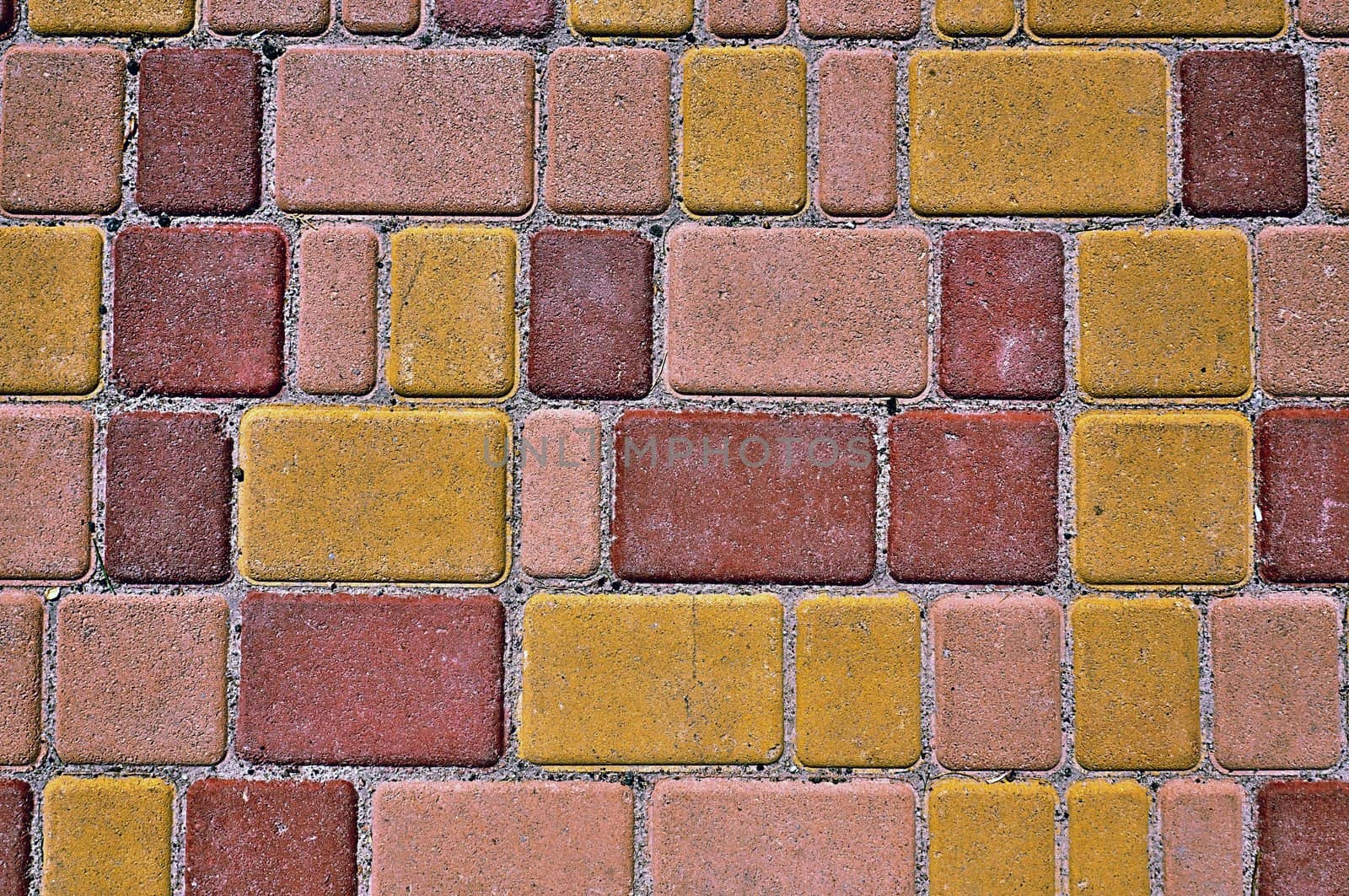Background - color bricks of a roadway close up