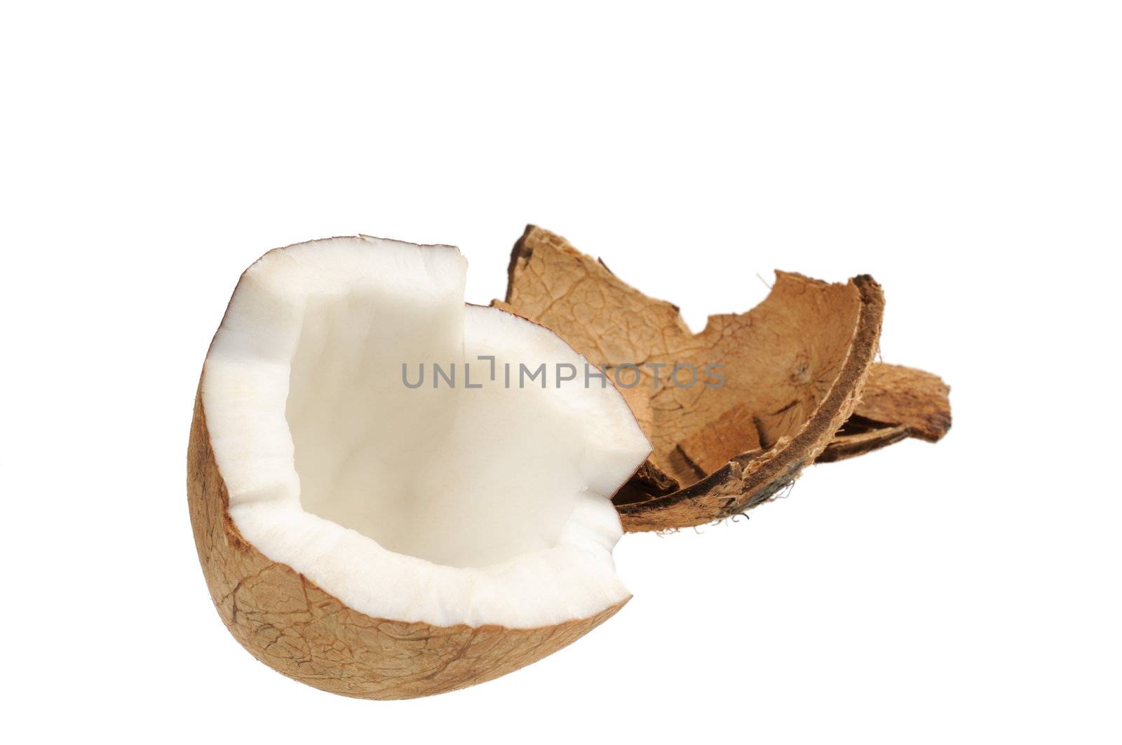 Fresh coconut and coconut shells. Isolated on white.