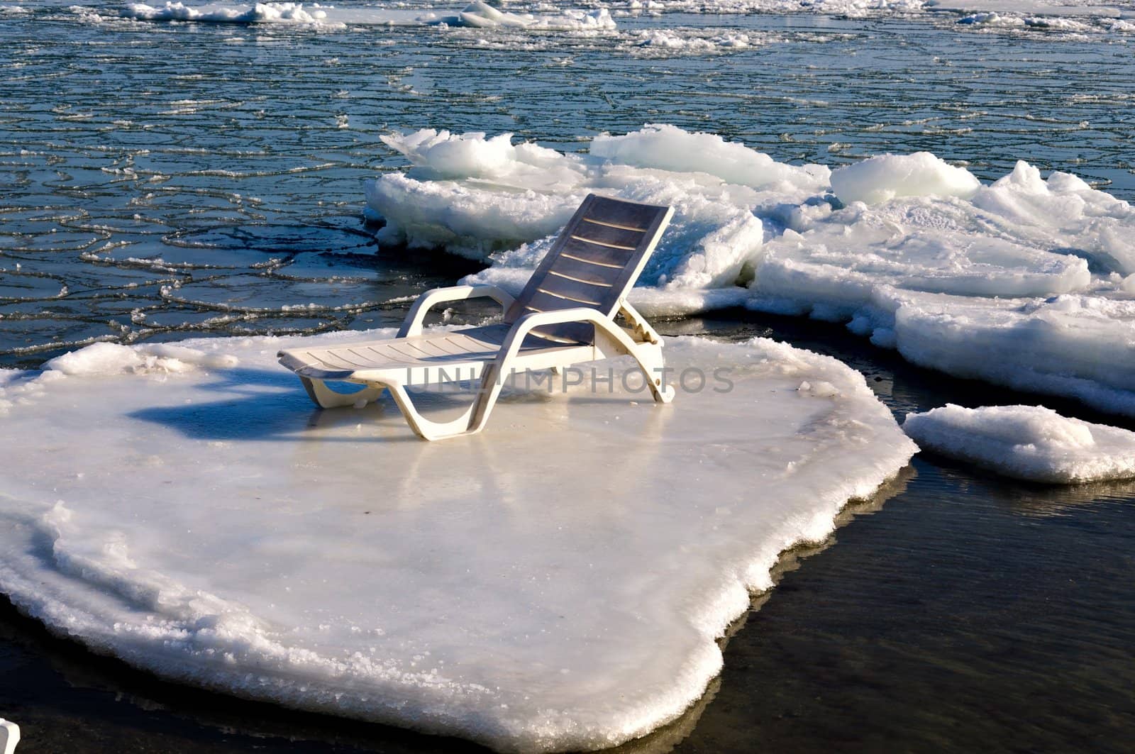 Empty chaise lounge on the ice floe