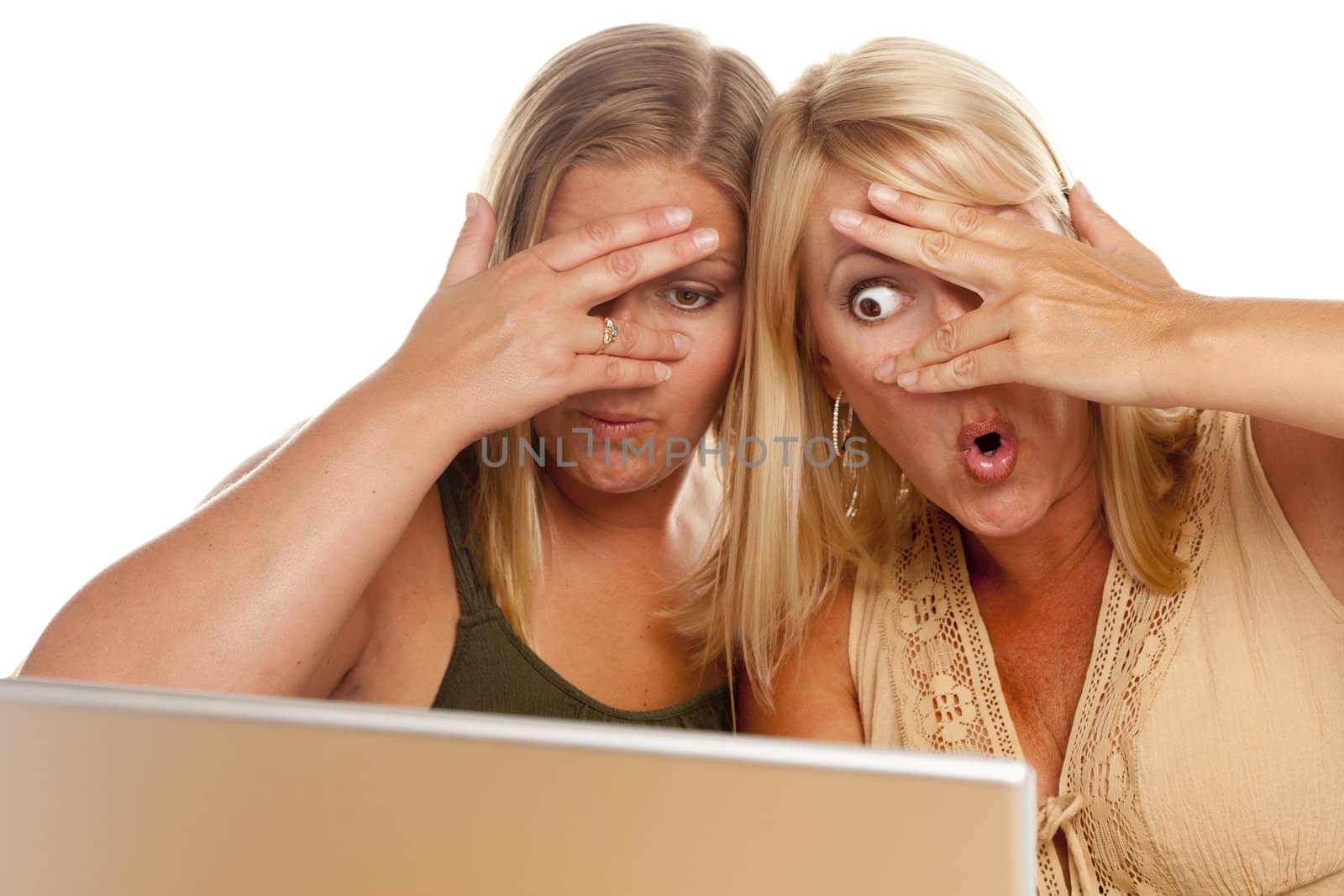 Two Shocked Women Using Laptop Isolated on a White Background.