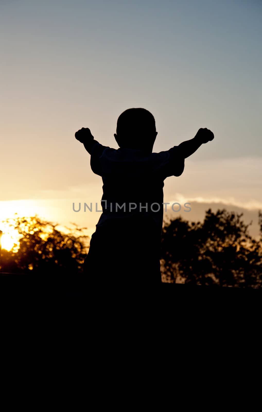 silhouette of children victory