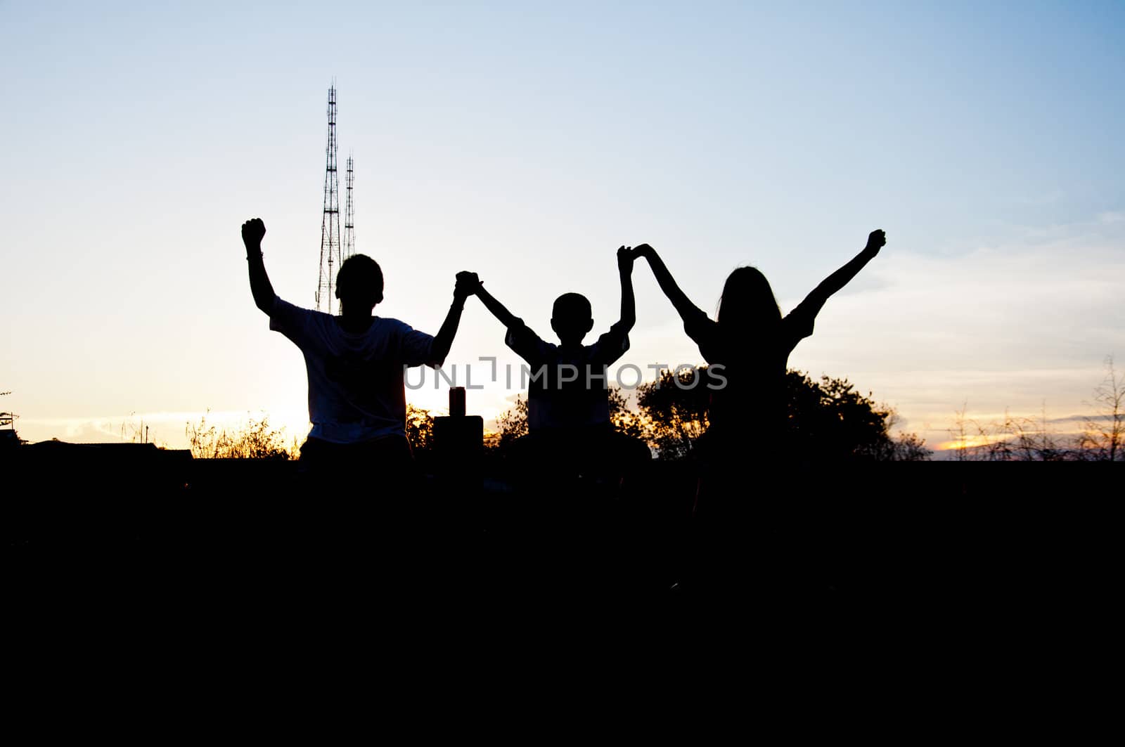 silhouette of children happy and victory