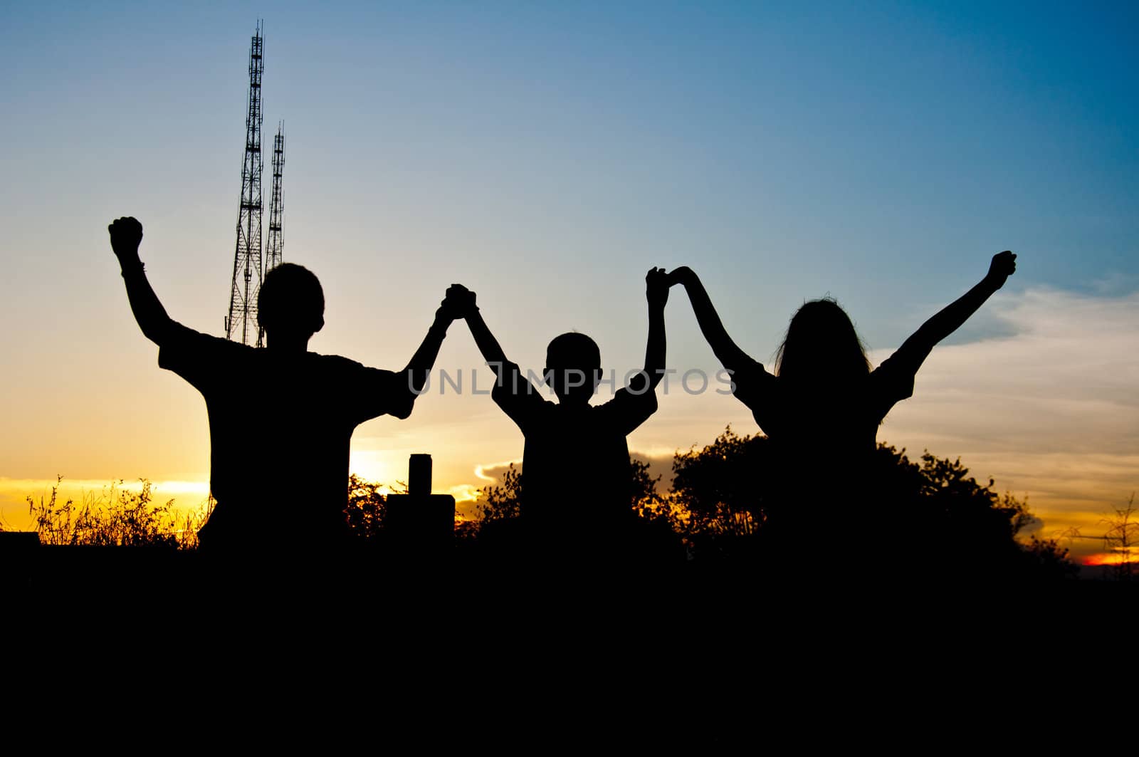 silhouette of children victory and happy