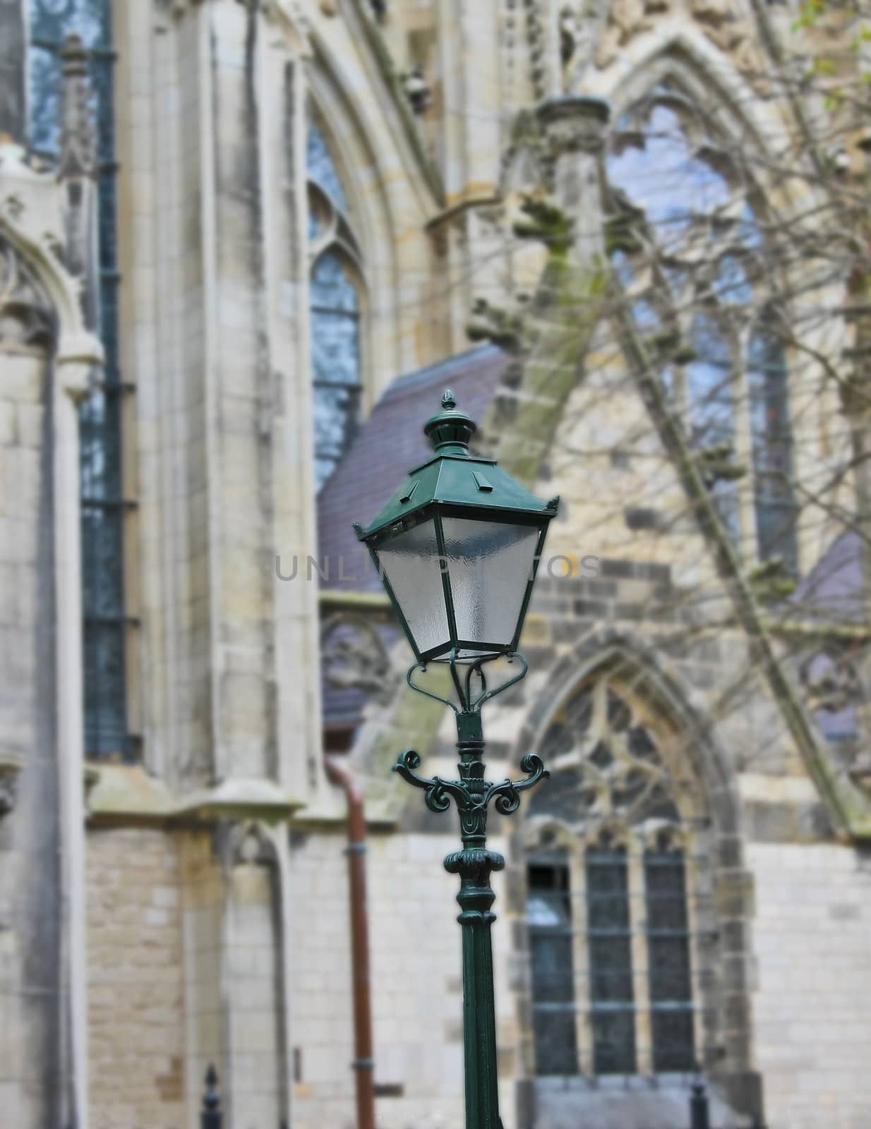 Street lamp on the background of the church by NickNick