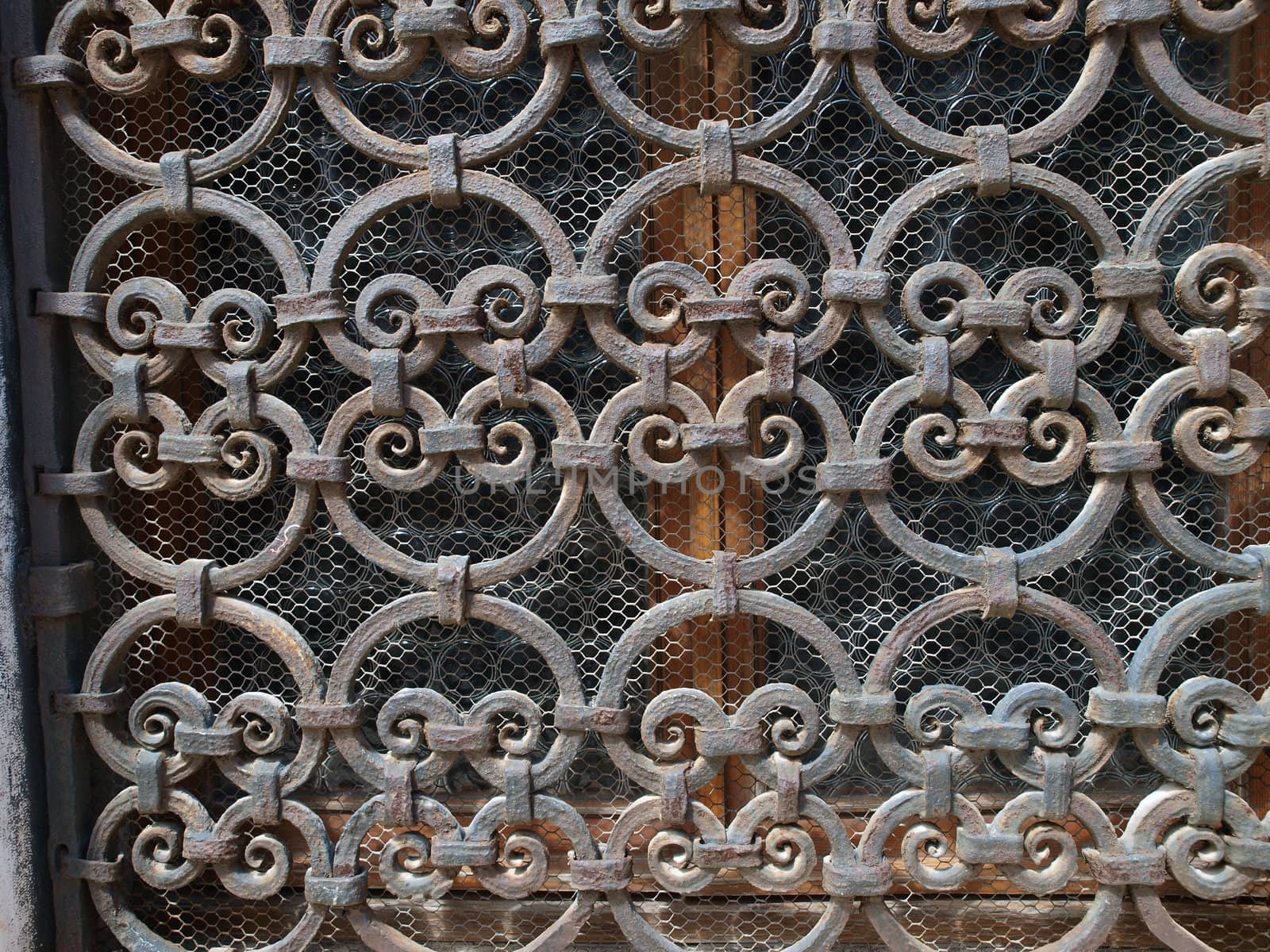Hand made solid iron grille in the window