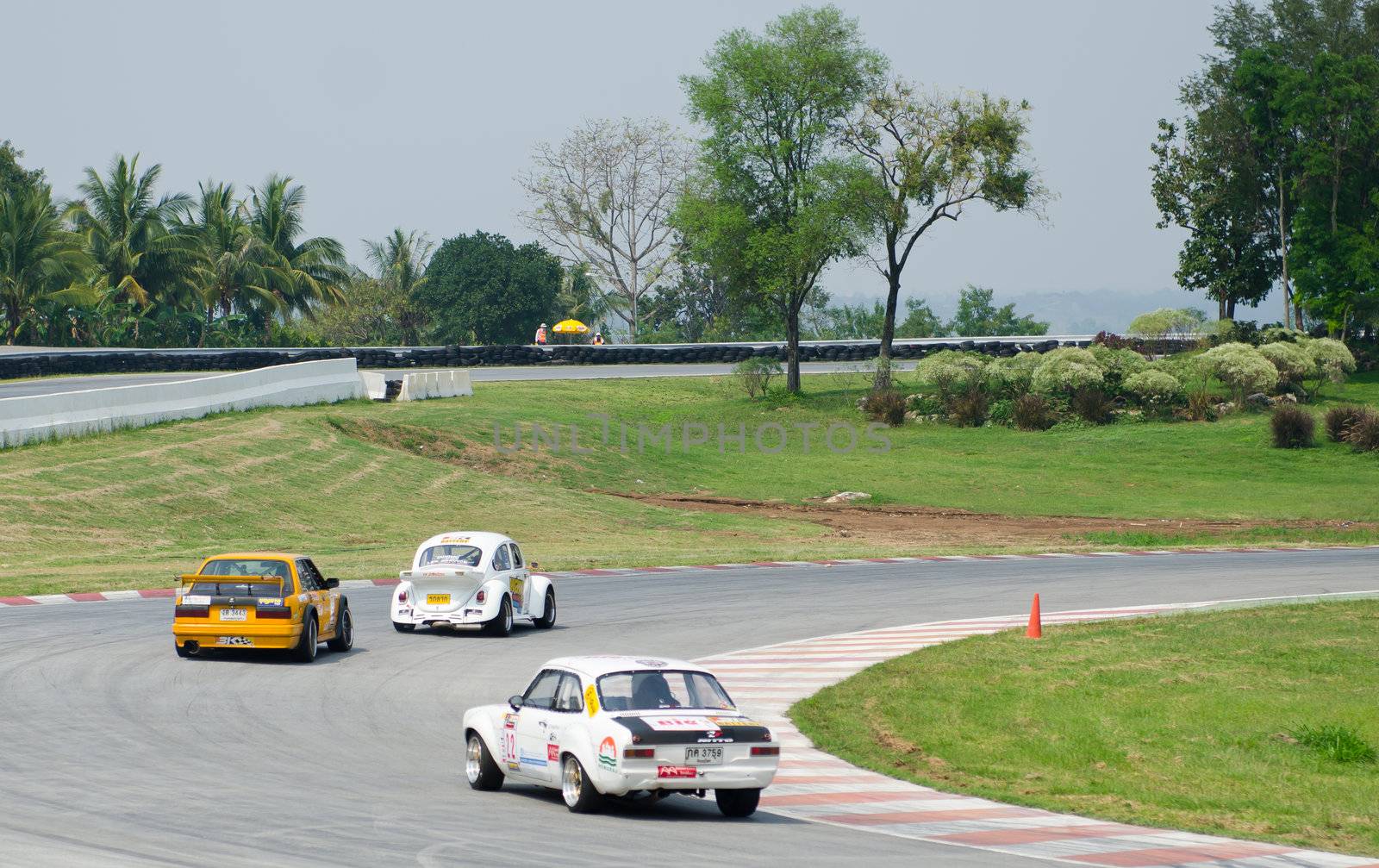 Nakhon Ratchasima, Thailand - March 9th:Unidentified car racing competitors during the "Thailand circuit 2013  " at Bonanza speedway on March 9th, 2013 in Nakhon Ratchasima, Thailand. 