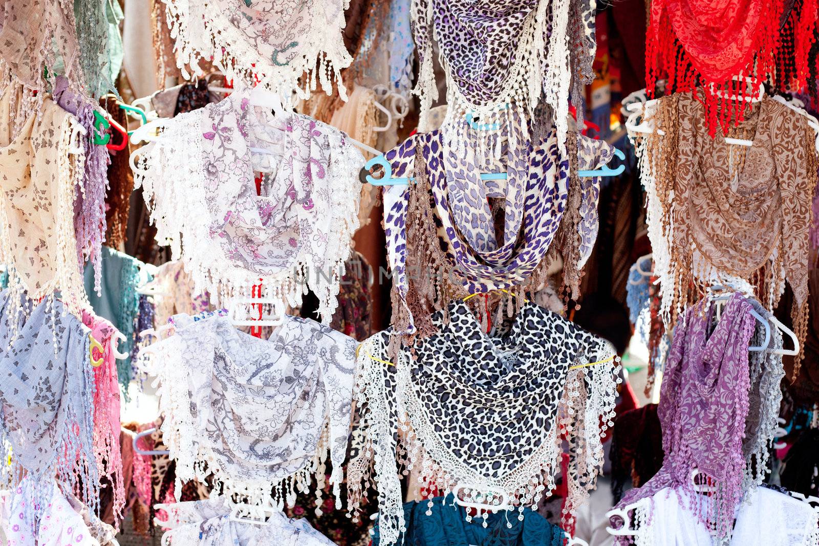 colorful fashion handkerchiefs on hangers display