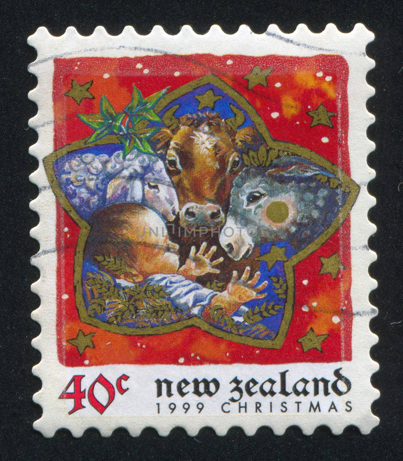 NEW ZEALAND - CIRCA 1999: stamp printed by New Zealand, shows Baby in Manger with Animals, circa 1999