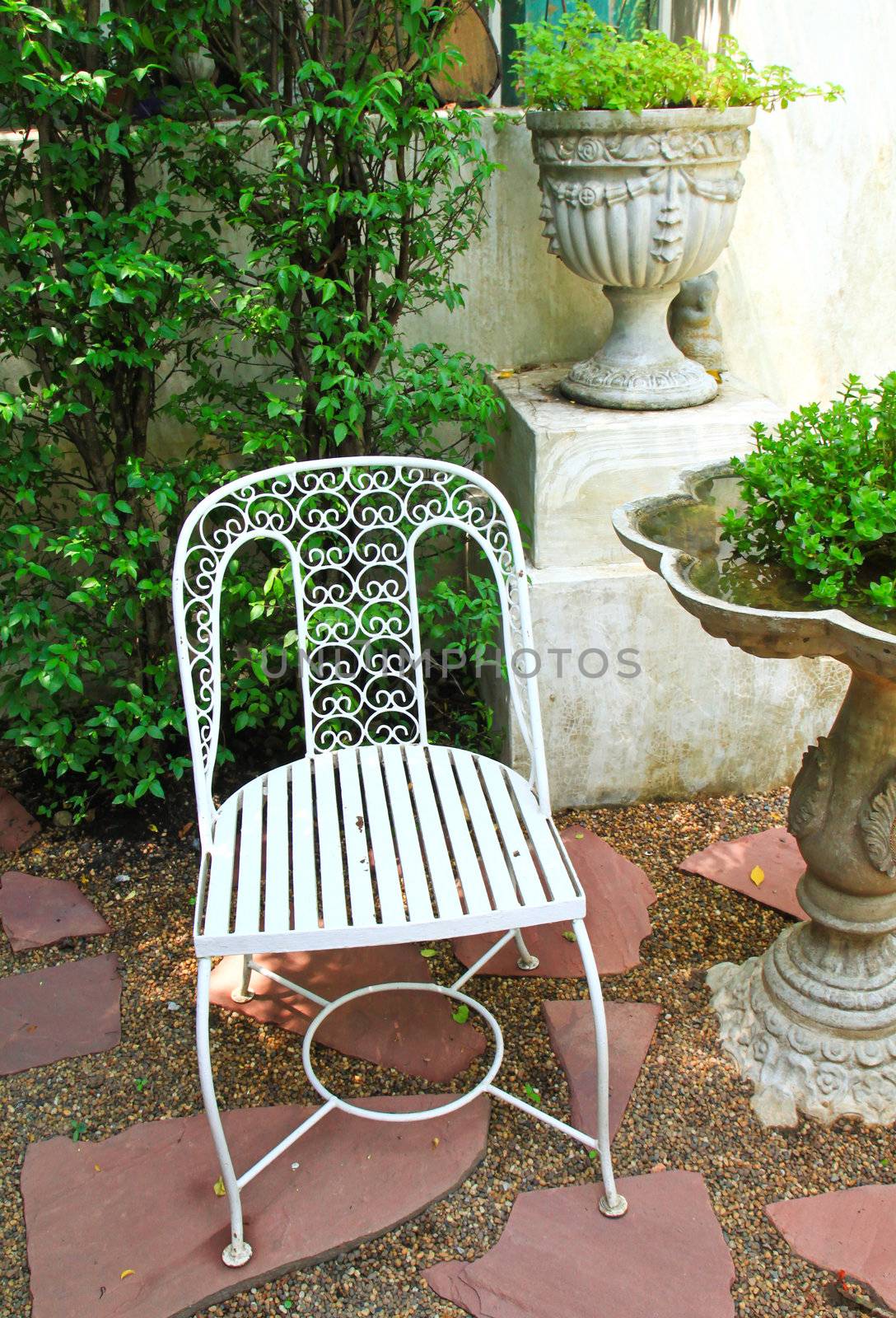 White chair in the garden by nuchylee