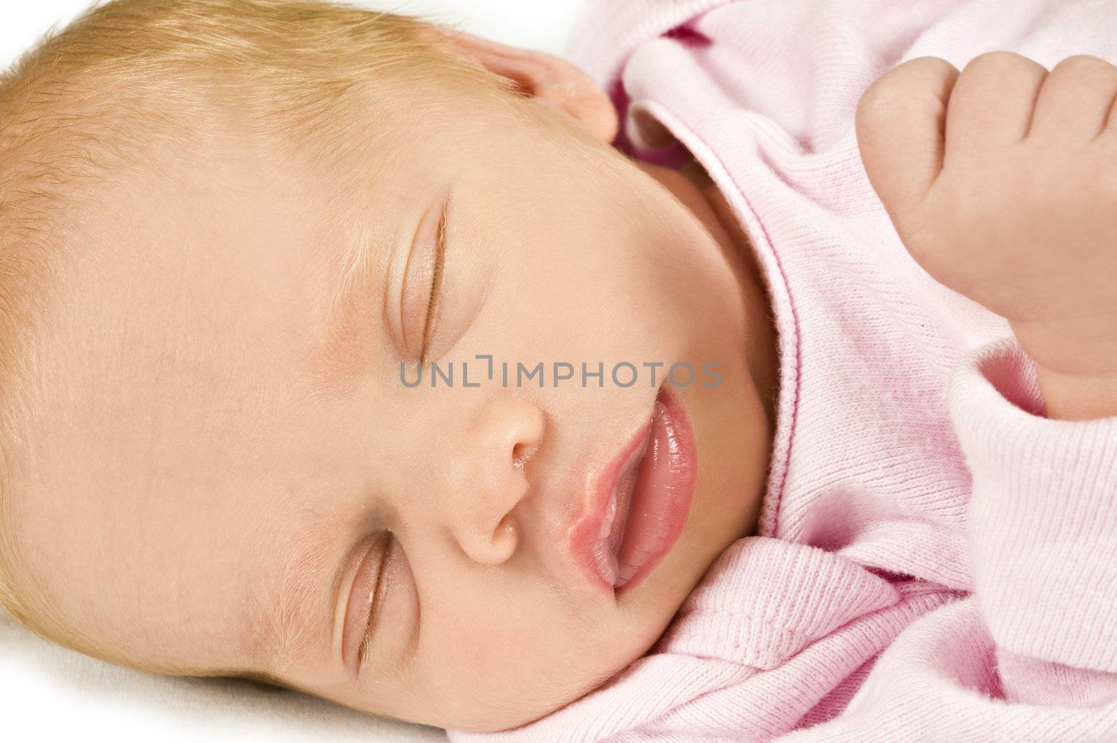 New born baby girl sleeping - close up