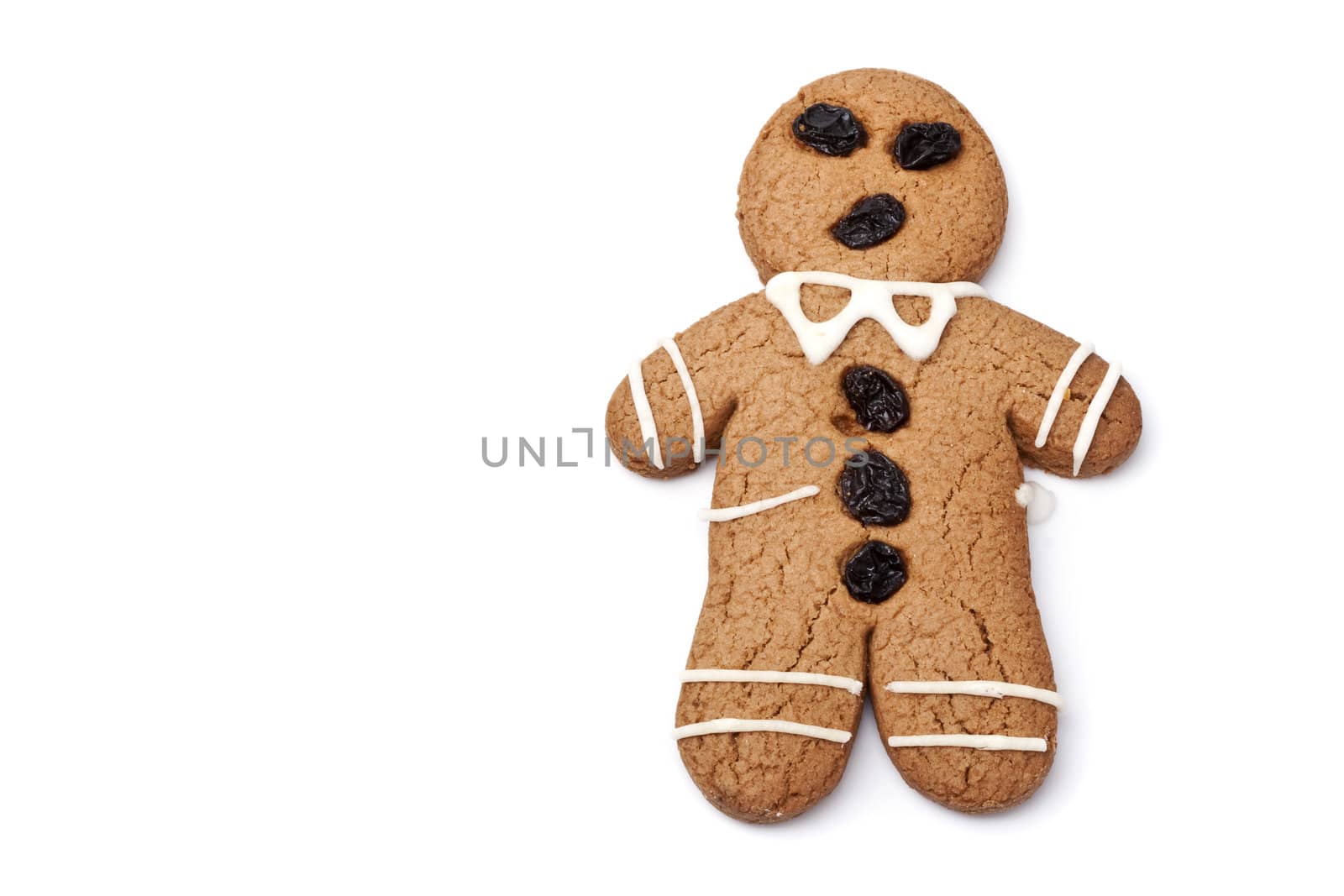Gingerbread man on white background with copy space.