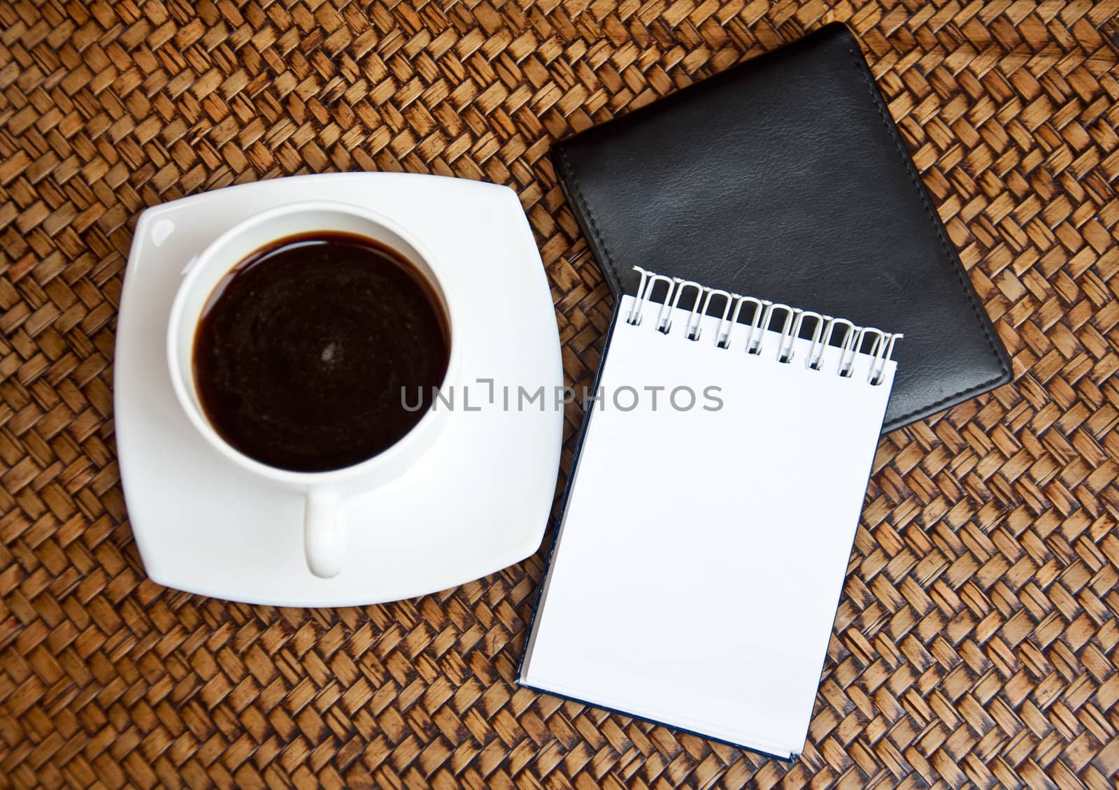 wallet and paper on sedge background