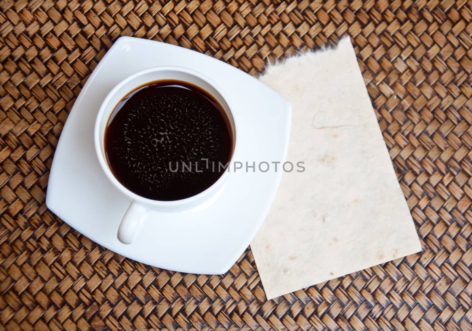 black coffe and paper notebook by buffaloboy