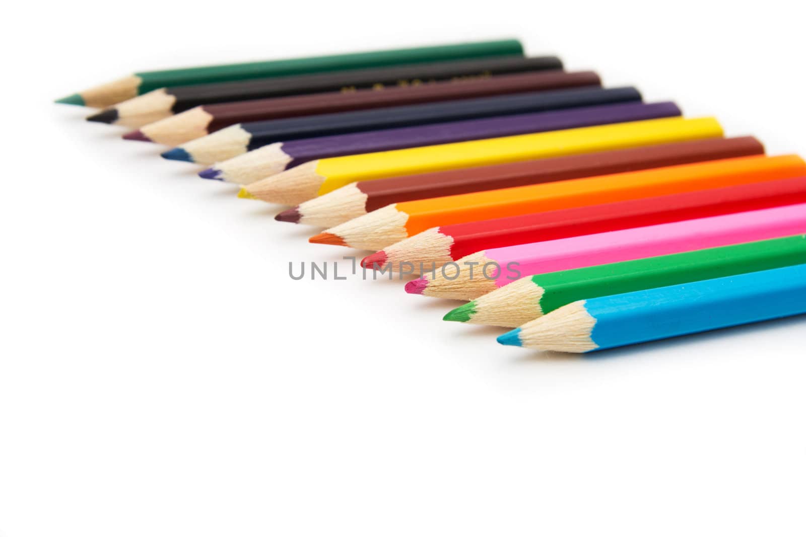 Colour pencils isolated on white background close up  by schankz