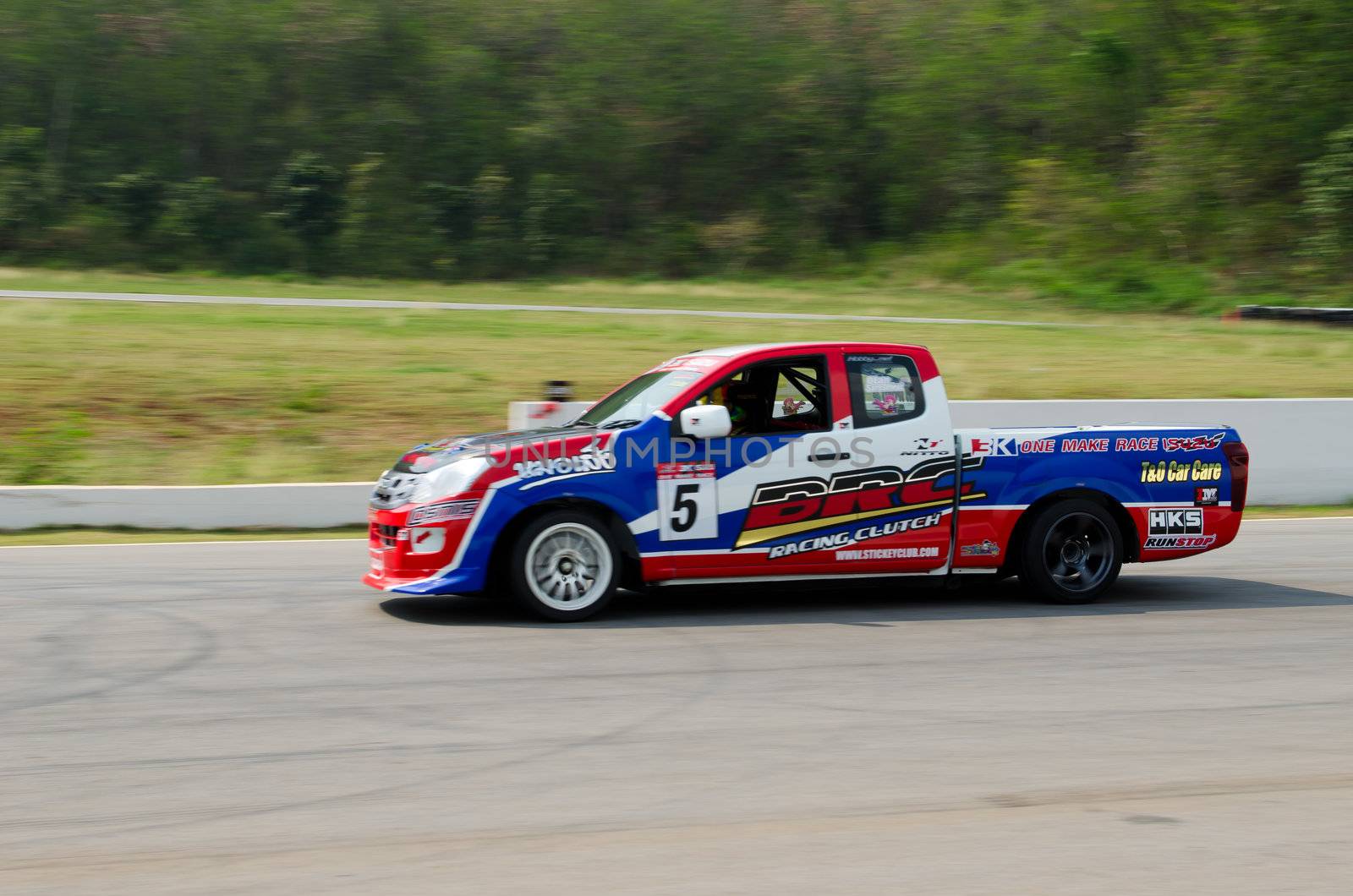 Nakhon Ratchasima, Thailand - March 9th:Unidentified car racing competitors during the "Thailand circuit 2013  " at Bonanza speedway on March 9th, 2013 in Nakhon Ratchasima, Thailand. 