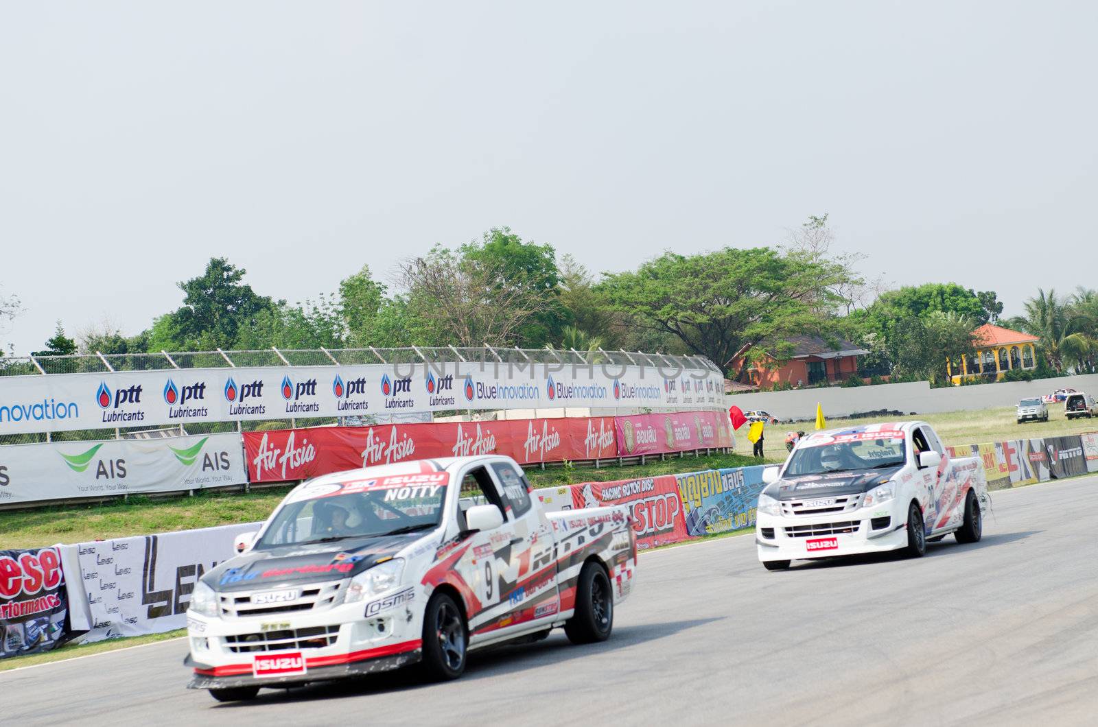 Nakhon Ratchasima, Thailand - March 9th:Unidentified car racing competitors during the "Thailand circuit 2013  " at Bonanza speedway on March 9th, 2013 in Nakhon Ratchasima, Thailand. 