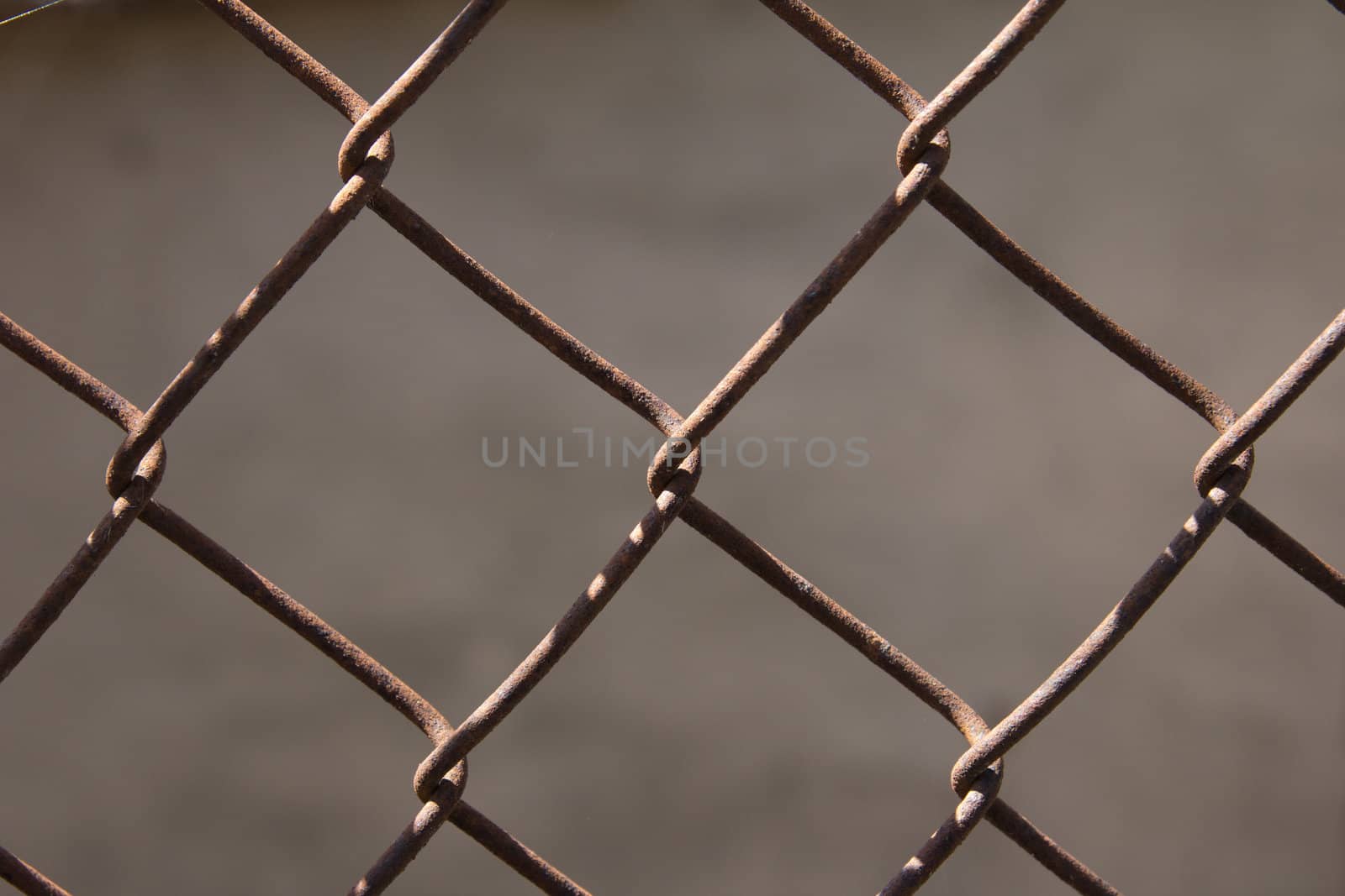 Rusty iron grid as a background by schankz