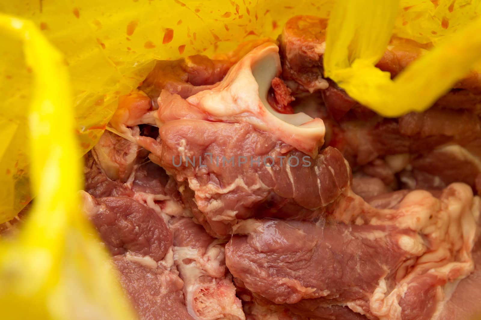 Fresh pork in a yellow package