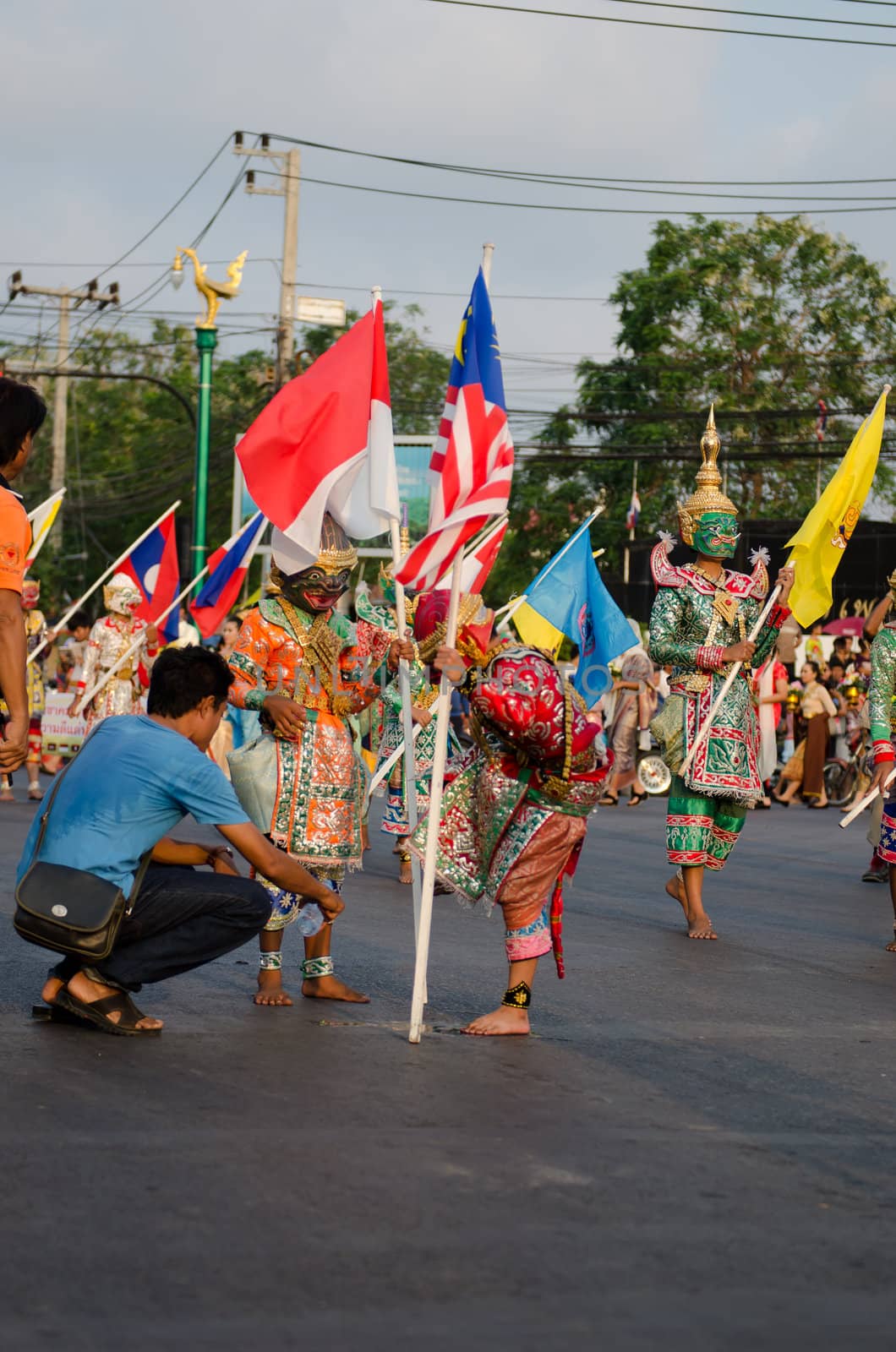 Phetchaburi, Thailand - March 28th:participants in Phranakhonkhiri festival parade 2013 on public street in front of Khao Wang  Phetchaburi on March 28th, 2013 in Phetchaburi Province, Thailand. 