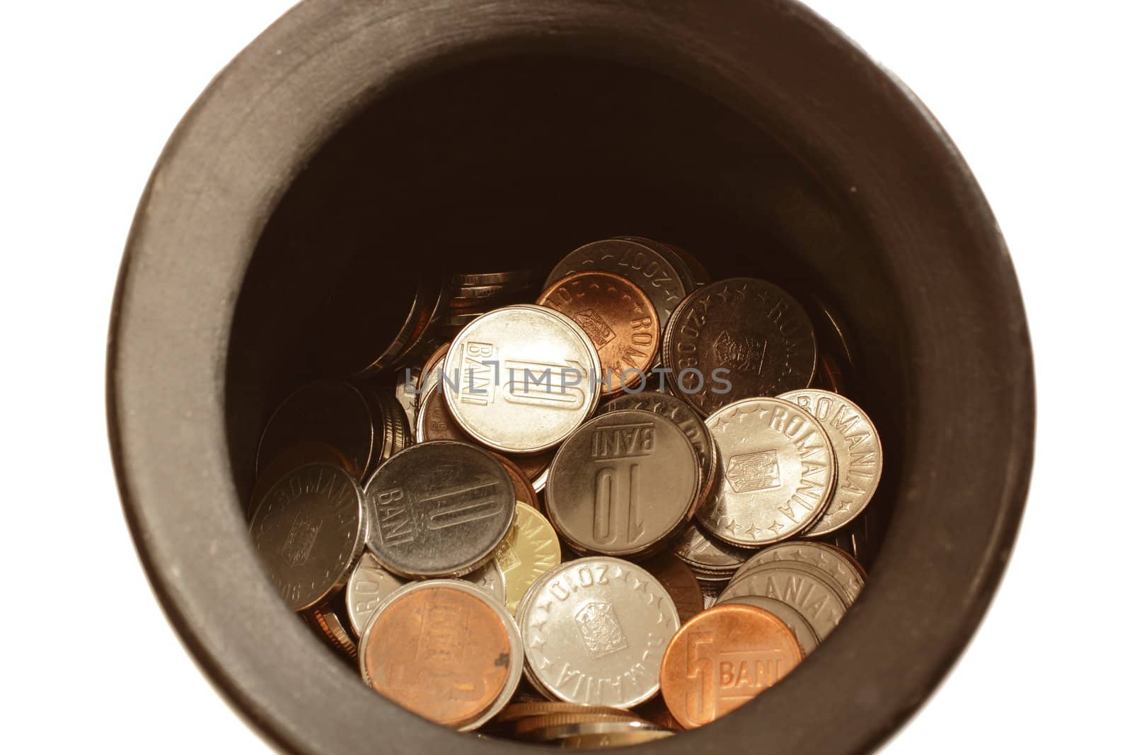 this is an old handmade  ceramics moneybox filled with romanian coins 