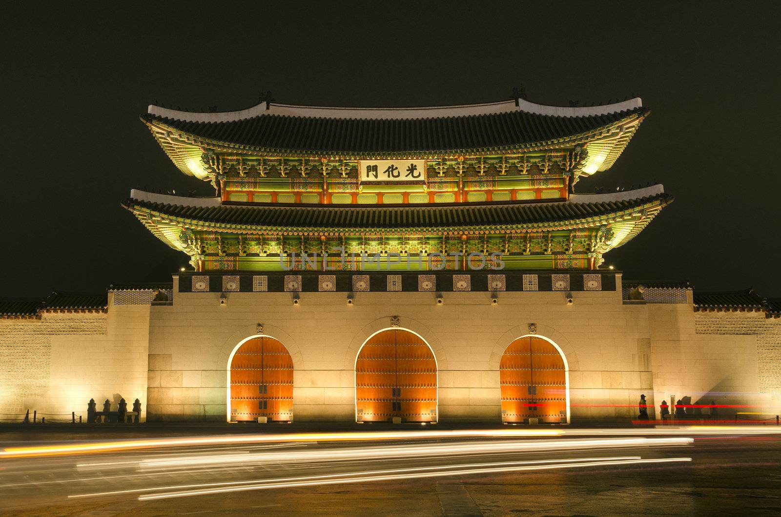 Gwanghwamun gate of Gyeongbokgung palace in seoul south korea at night by jackmalipan