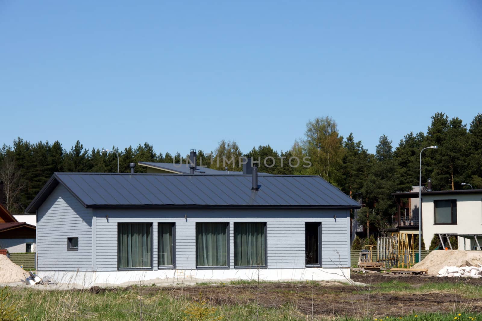 The modern house is constructed in a countryside