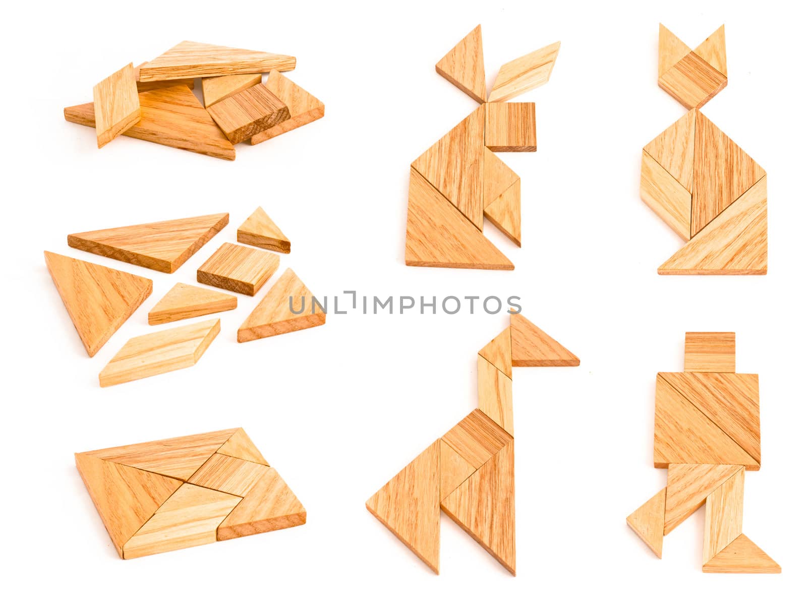 Isolated views of wooden tangram with few finished figures