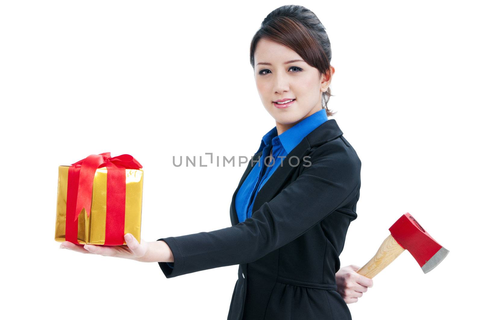 Businesswoman presenting a gift box infront and holding an axe behind her back, isolated on white.