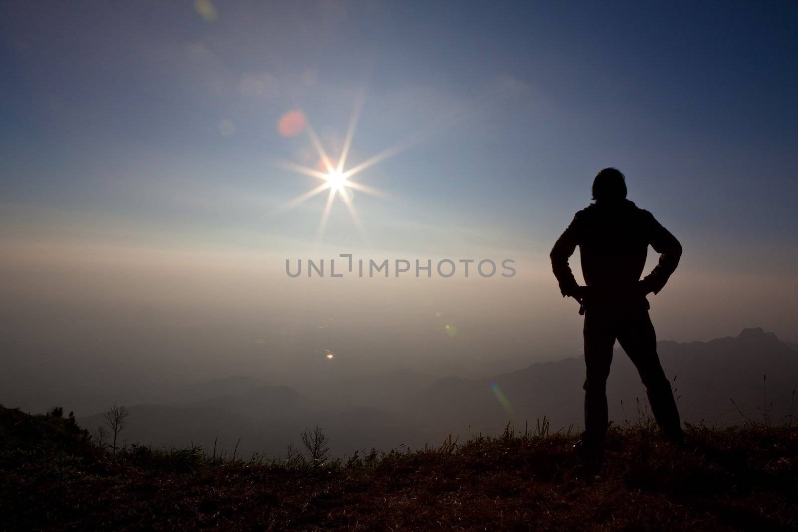 silhouette of a man on the Mountain