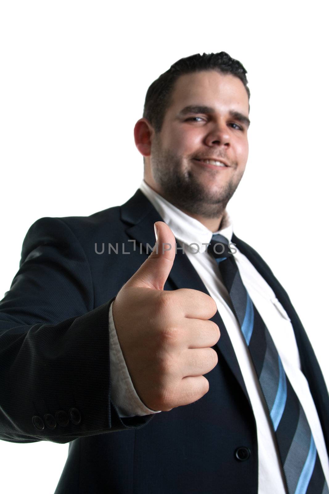 portrait of young Businessman showing thumb up gesture 