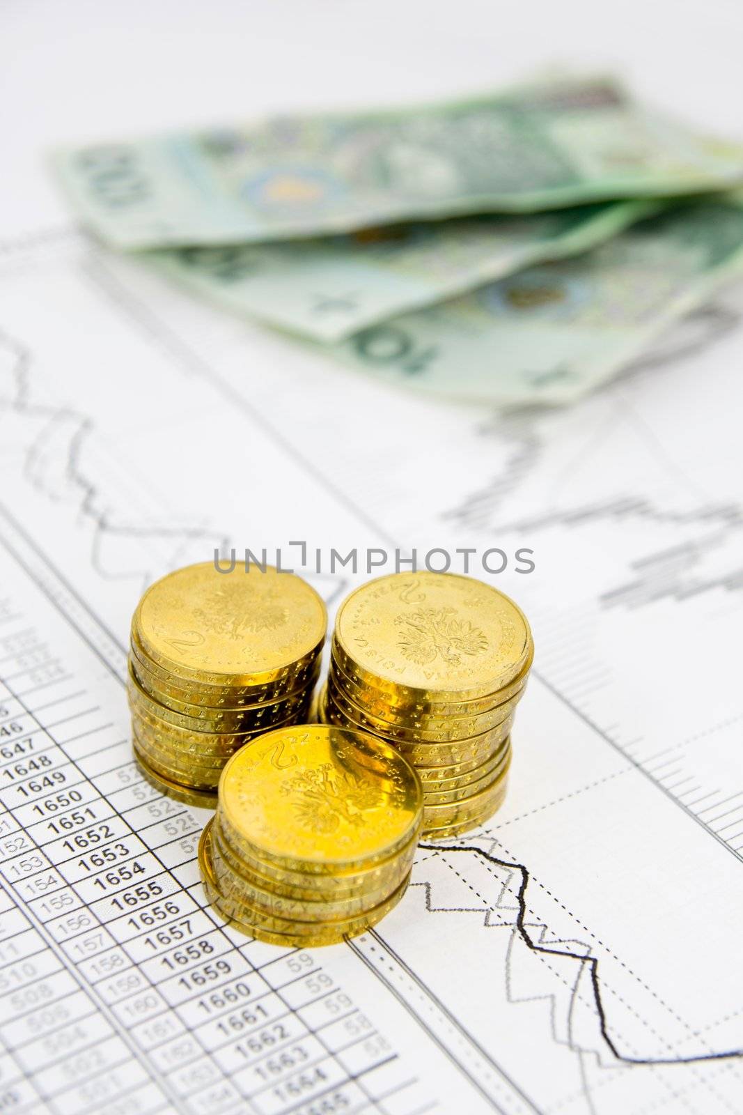 Golden coins concept on business background by simpson33