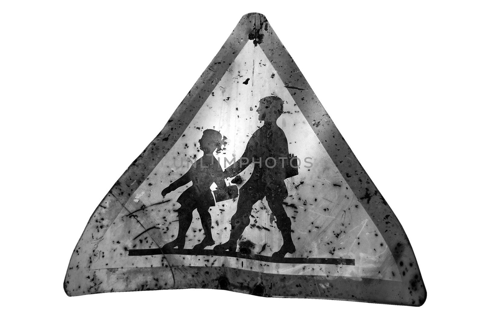 Rusty warning sign for school children. Black and white.