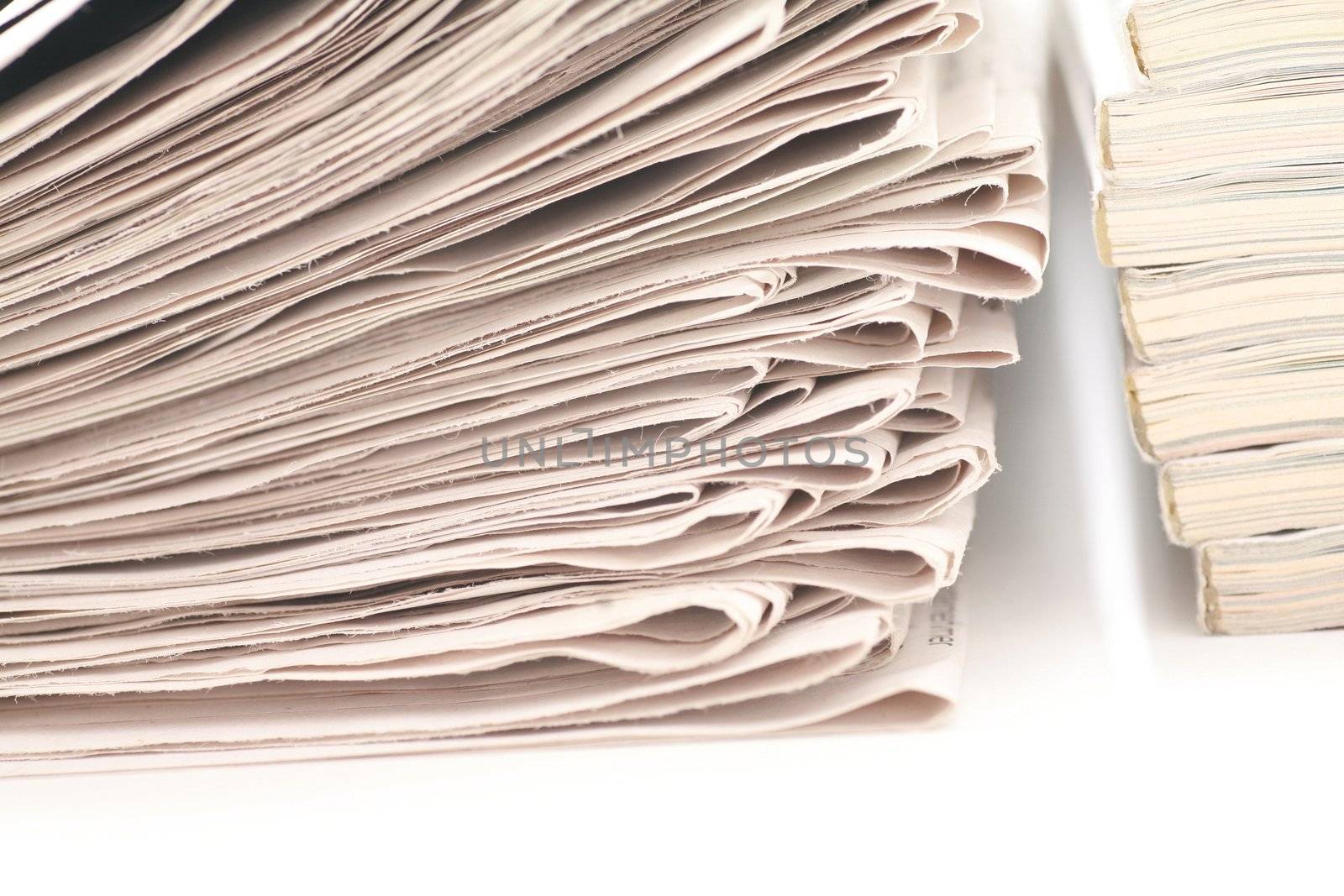 close-up of newspapers/magazine on a white backgroung.