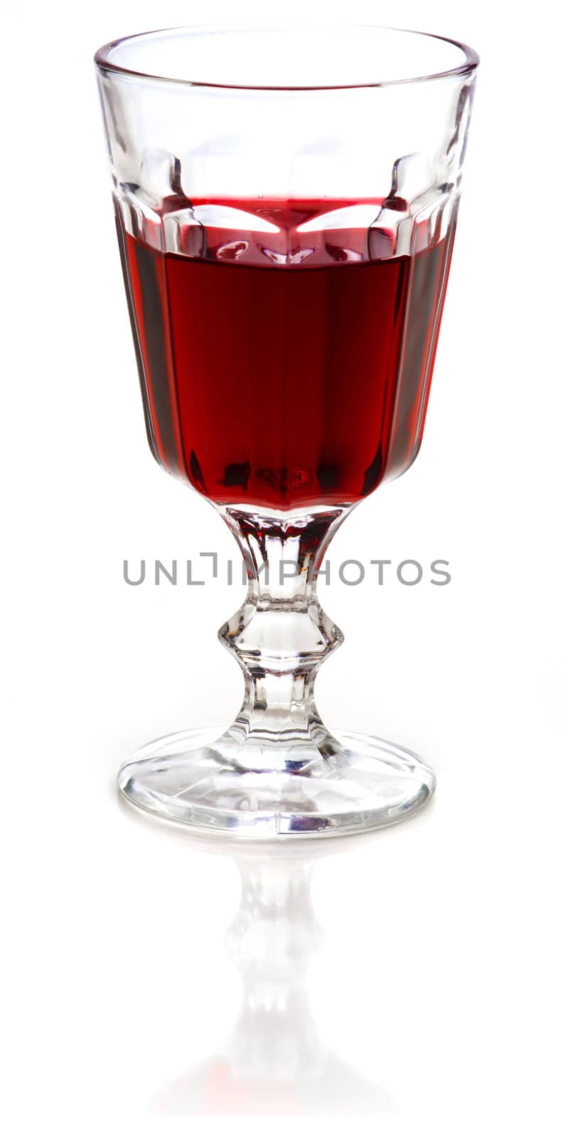 Glass of red wine on a white background.