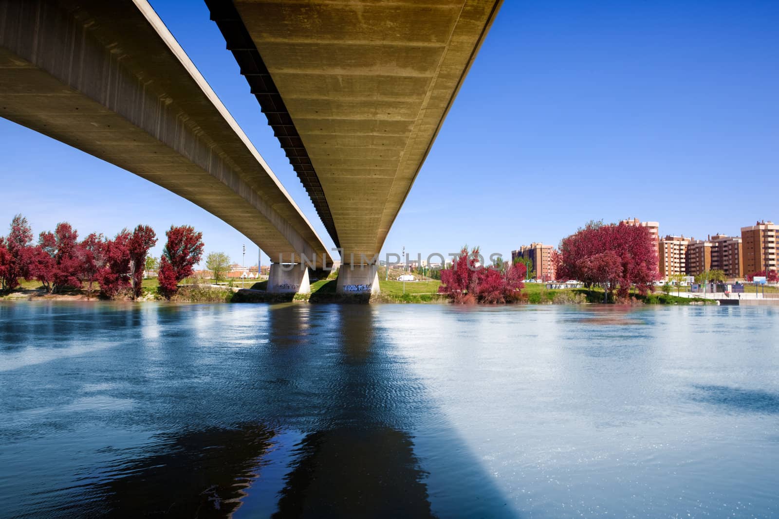 Architectural image of concrete bridge and river