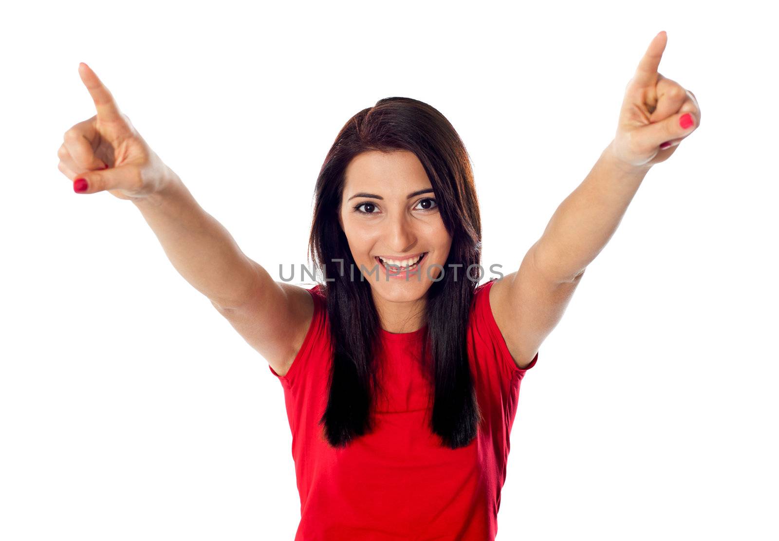 Portrait of a excited pretty teenager by stockyimages