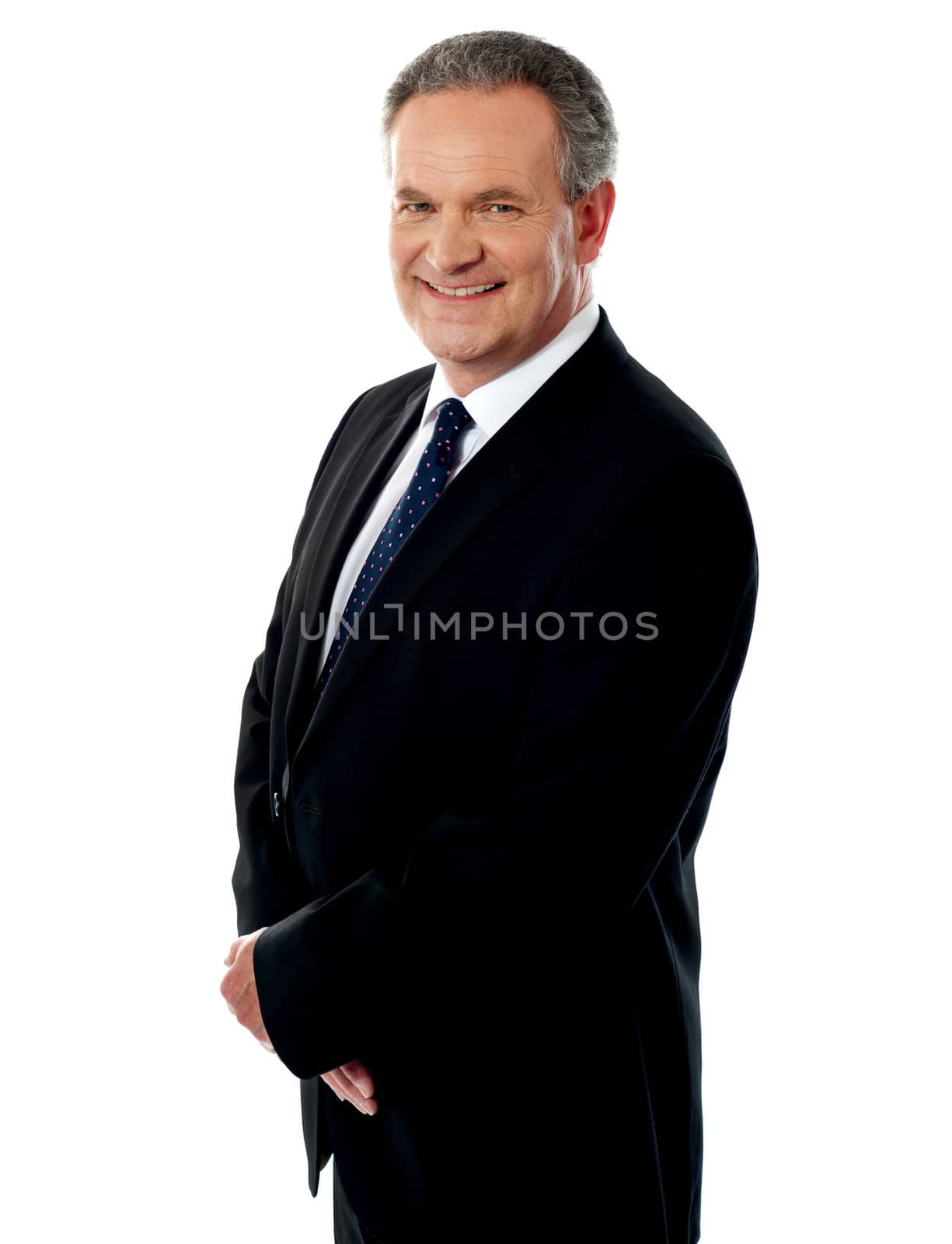 Portrait of a happy matured businessman by stockyimages