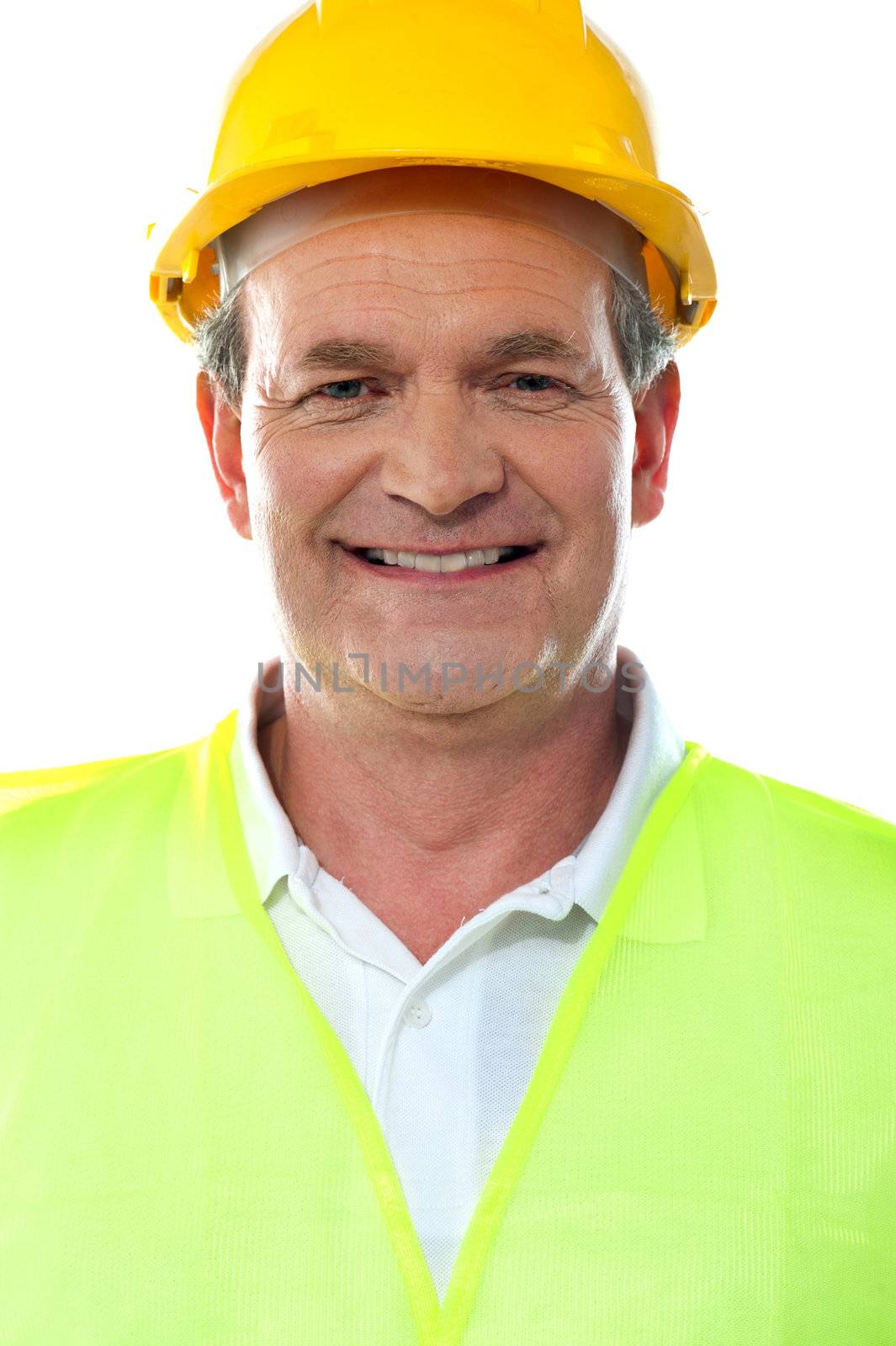 Smiling builder wearing hardhat. Closeup portrait