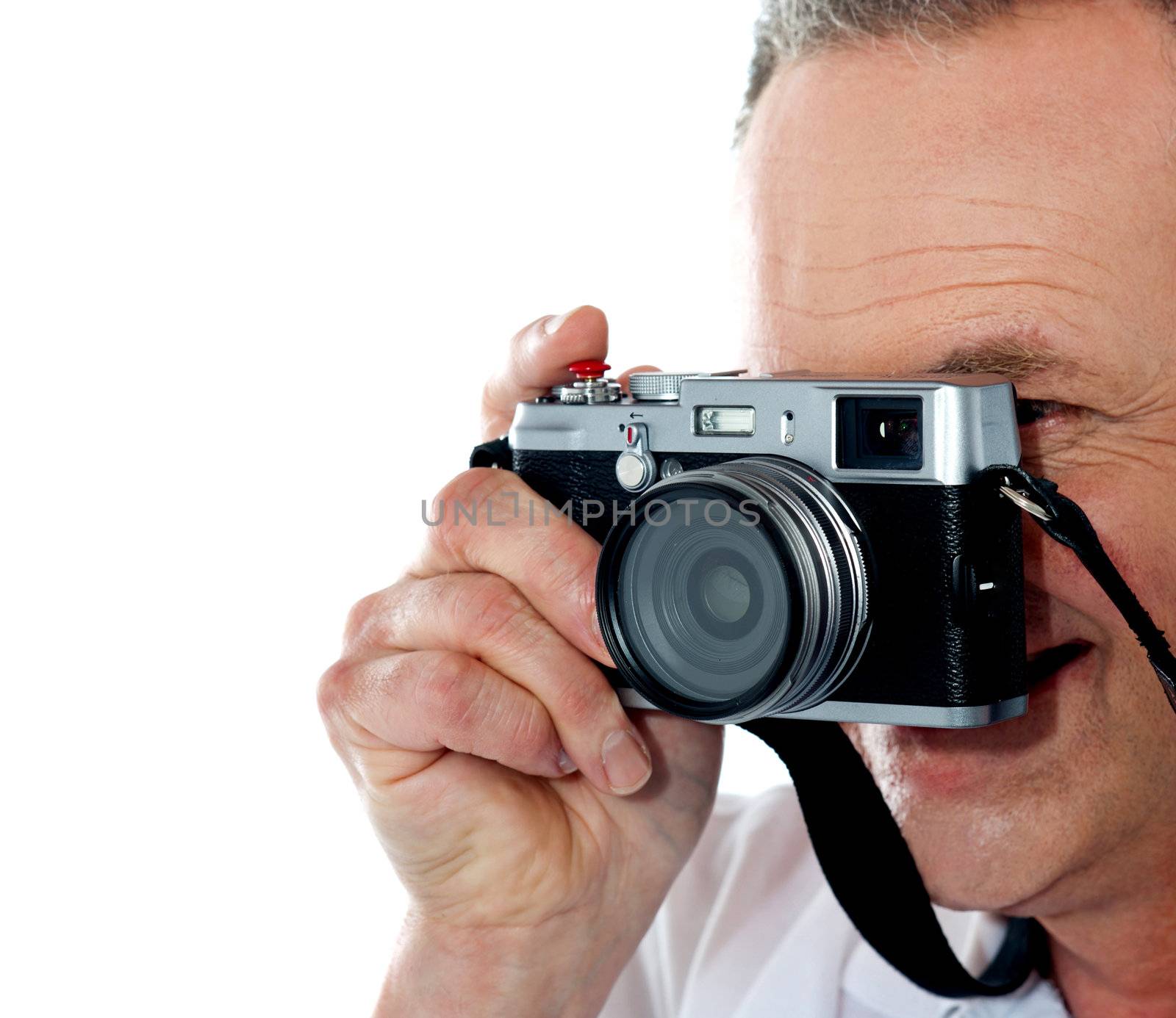 Cropped image of aged male photographer by stockyimages