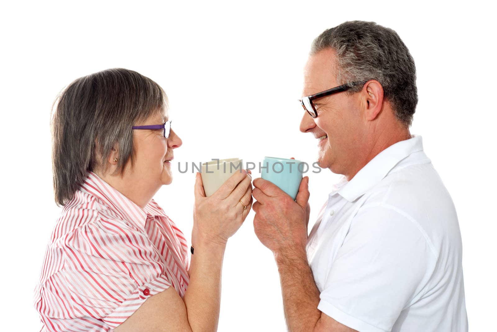 Portrait of a romantic senior old couple enjoying coffee together