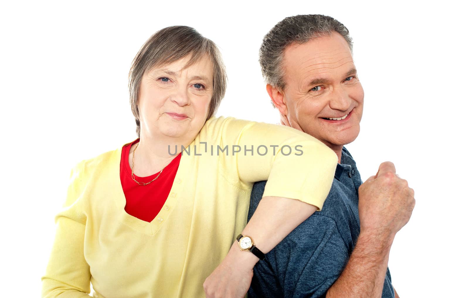 Portrait of senior couple back to back isolated over white background