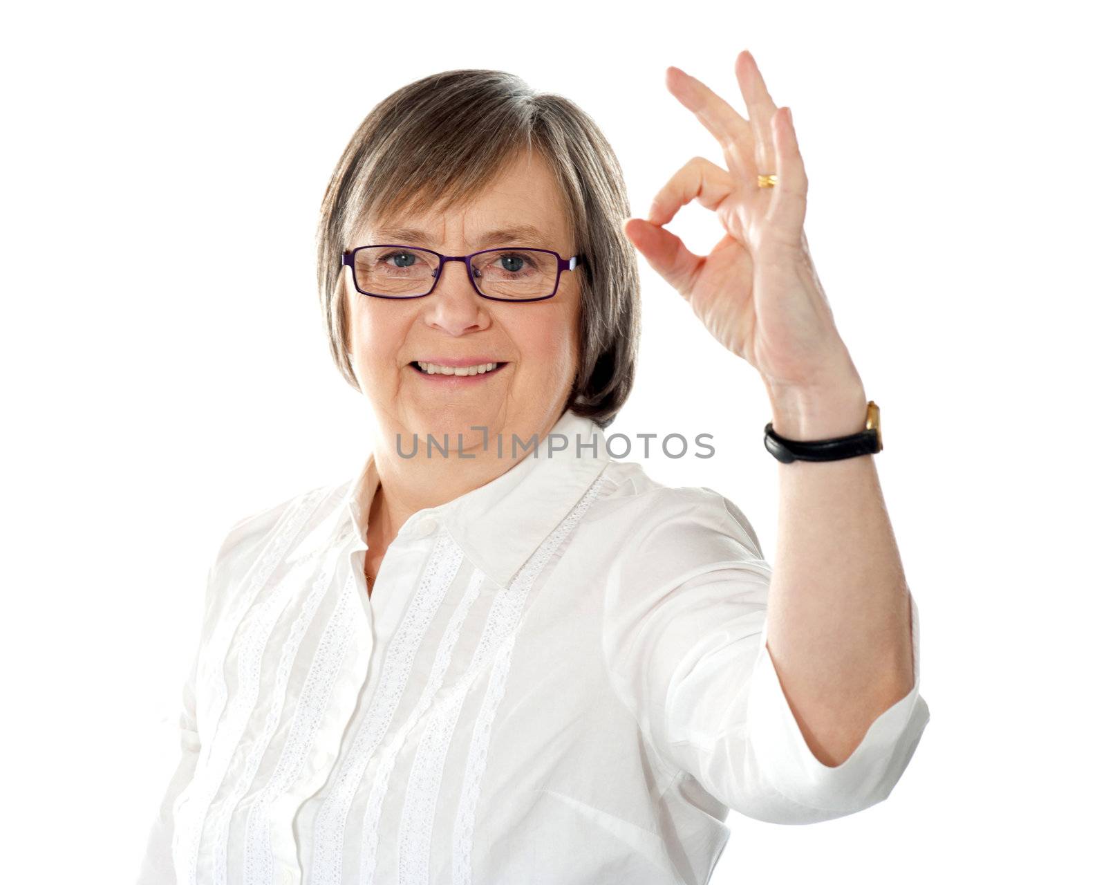 American lady gesturing excellence sign by stockyimages