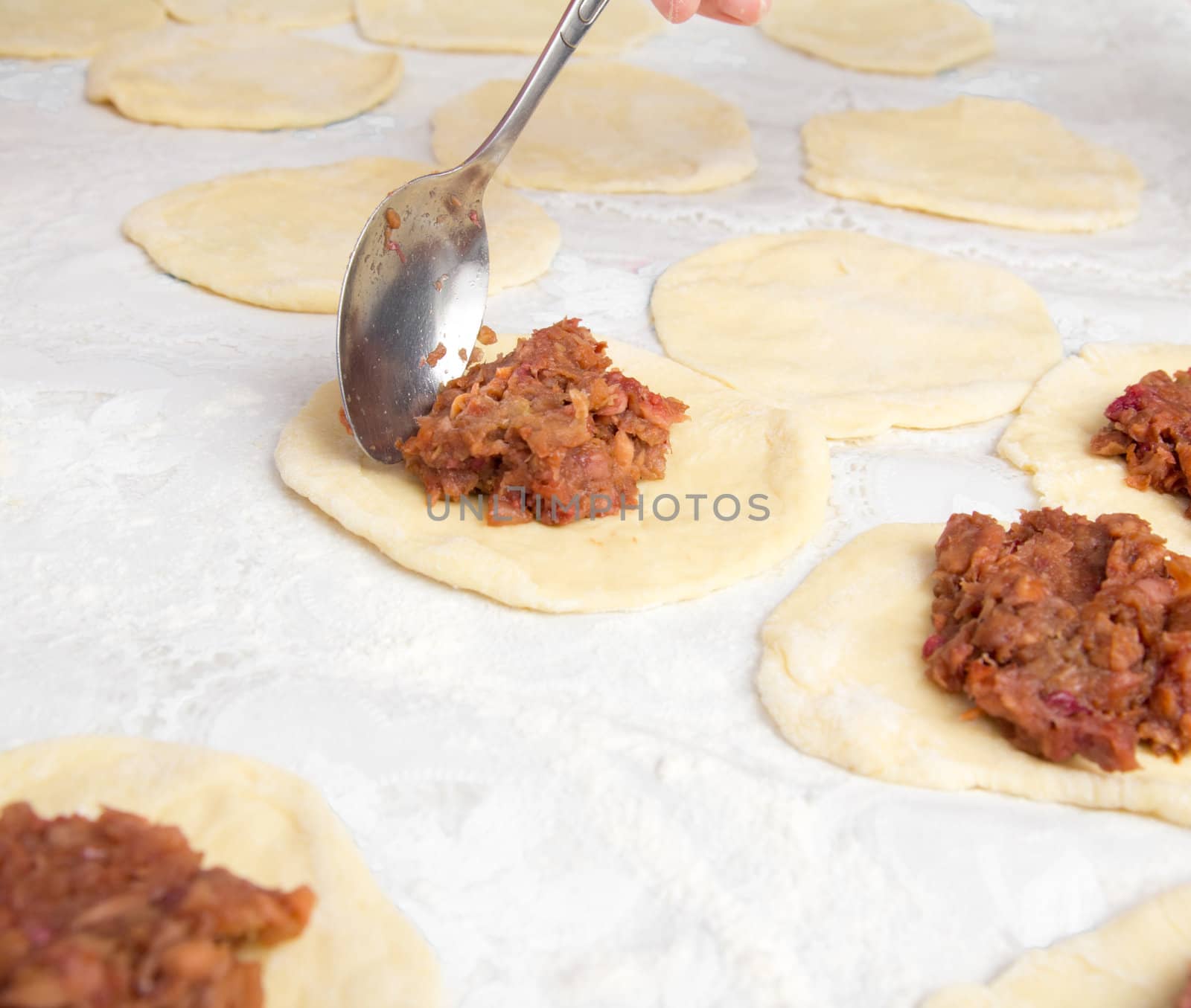 rolled out dough with jam