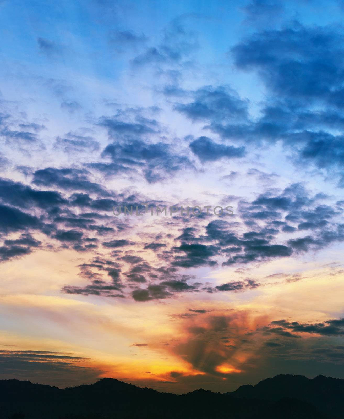 Sunset over the mountains, Thailand, Krabi, vertical