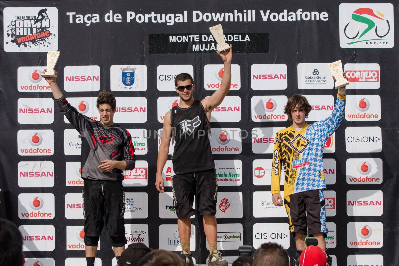 VIANA DO CASTELO, PORTUGAL - MAY 13: Promotion winner Jorge Barbosa in the middle at the podium on the 4th Stage of the Taca de Portugal Downhill Vodafone on may 13, 2012 in Viana do Castelo, Portugal.