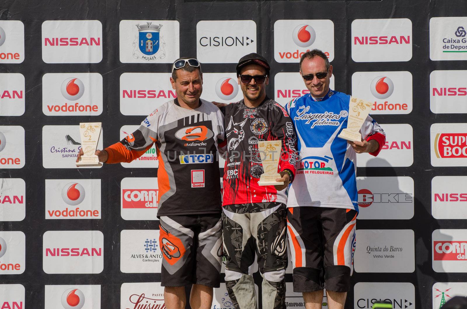 VIANA DO CASTELO, PORTUGAL - MAY 13: Master 40 winner Joao Estevao in the middle at the podium on the 4th Stage of the Taca de Portugal Downhill Vodafone on may 13, 2012 in Viana do Castelo, Portugal.