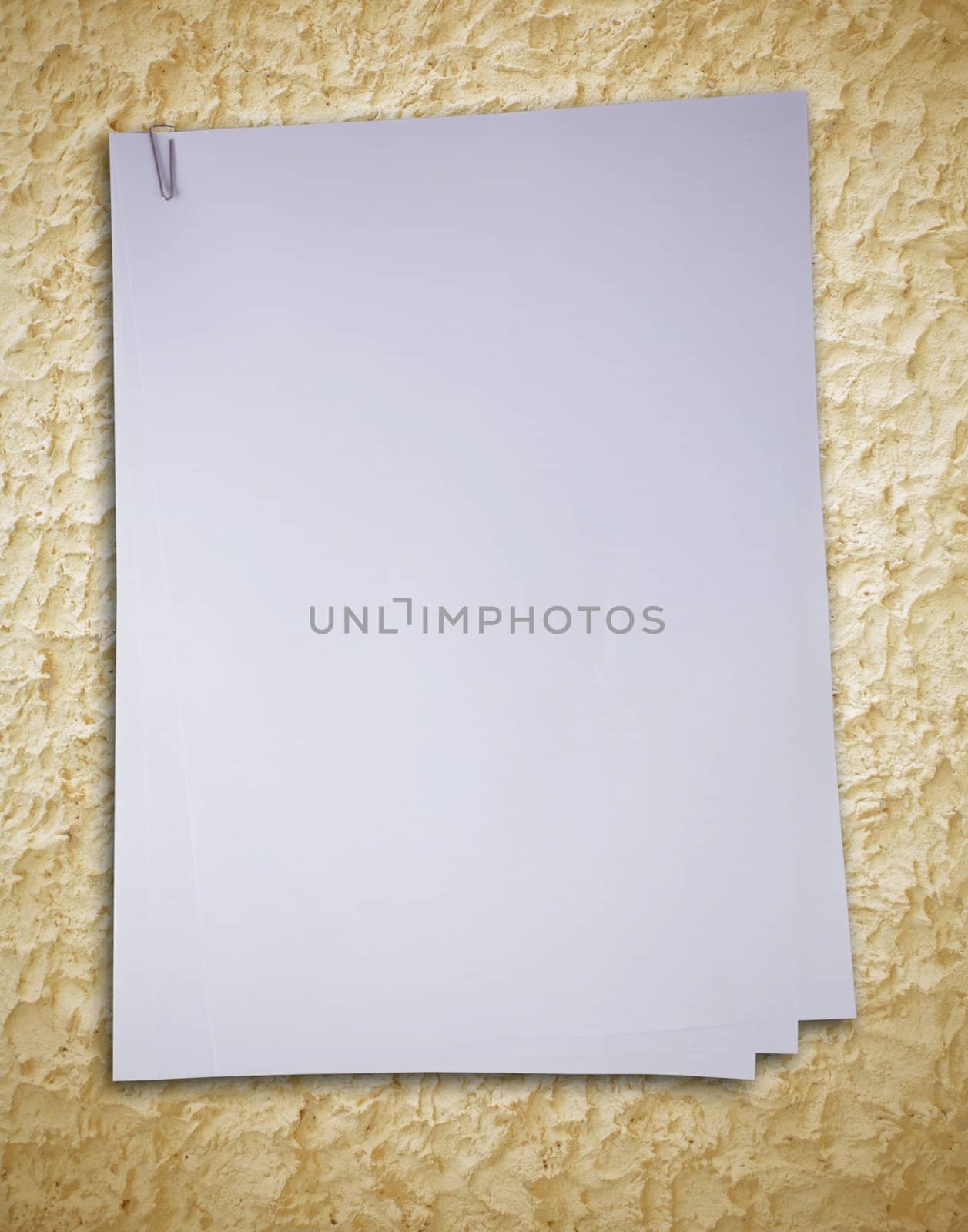 old white paper on rough wall background