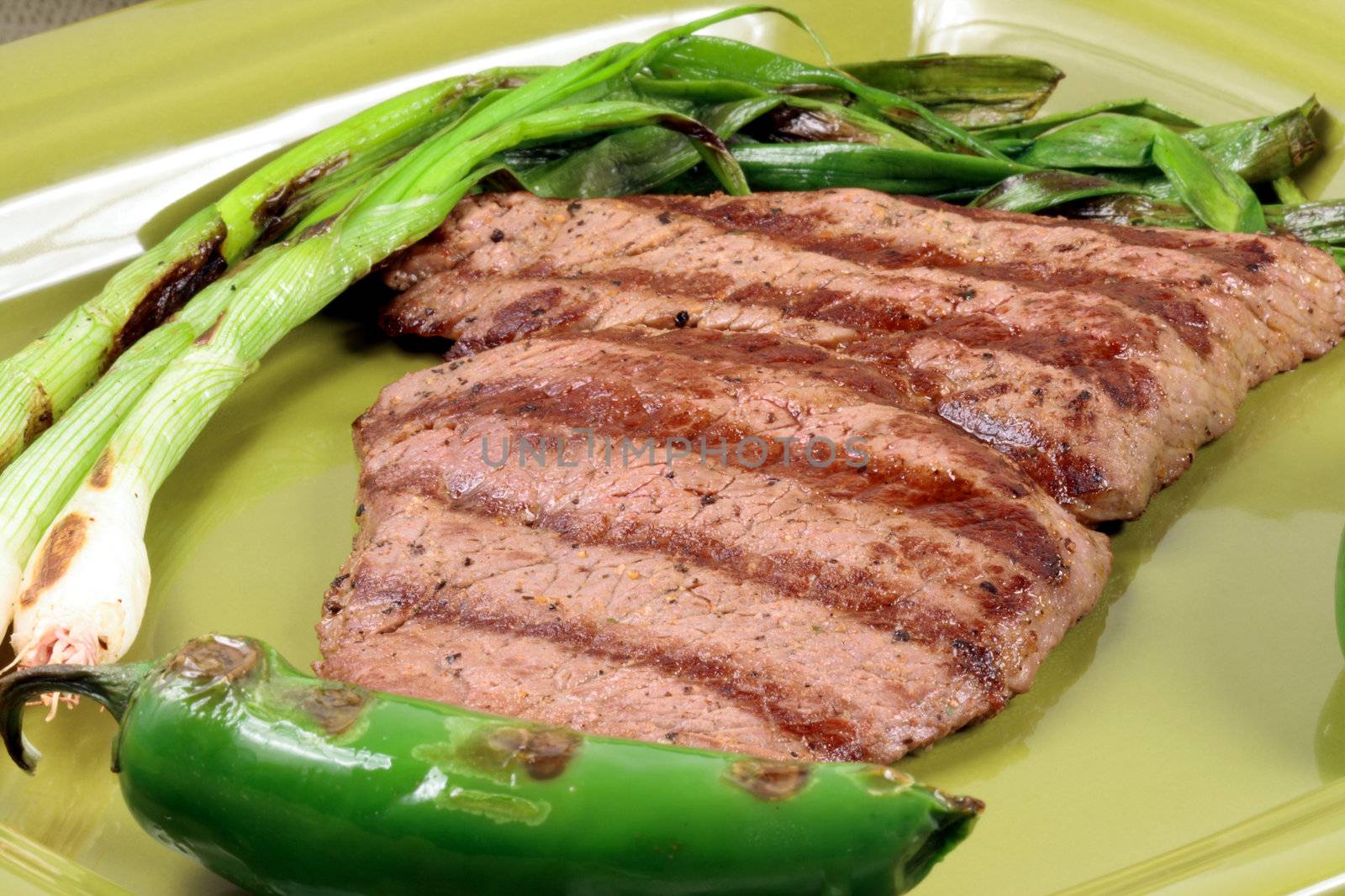 mexican Juicy beef grilled to perfection thick and flavorful cut with hot peppers    